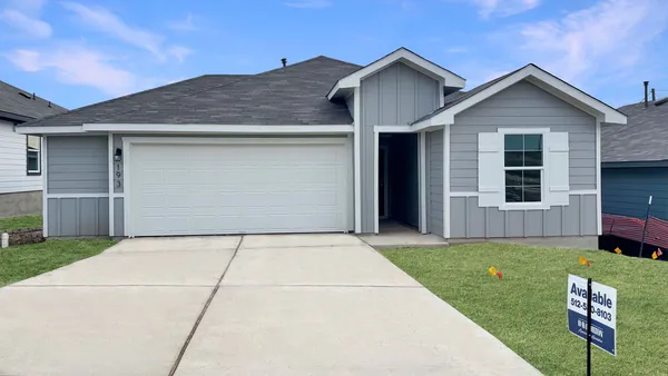 a front view of house with yard