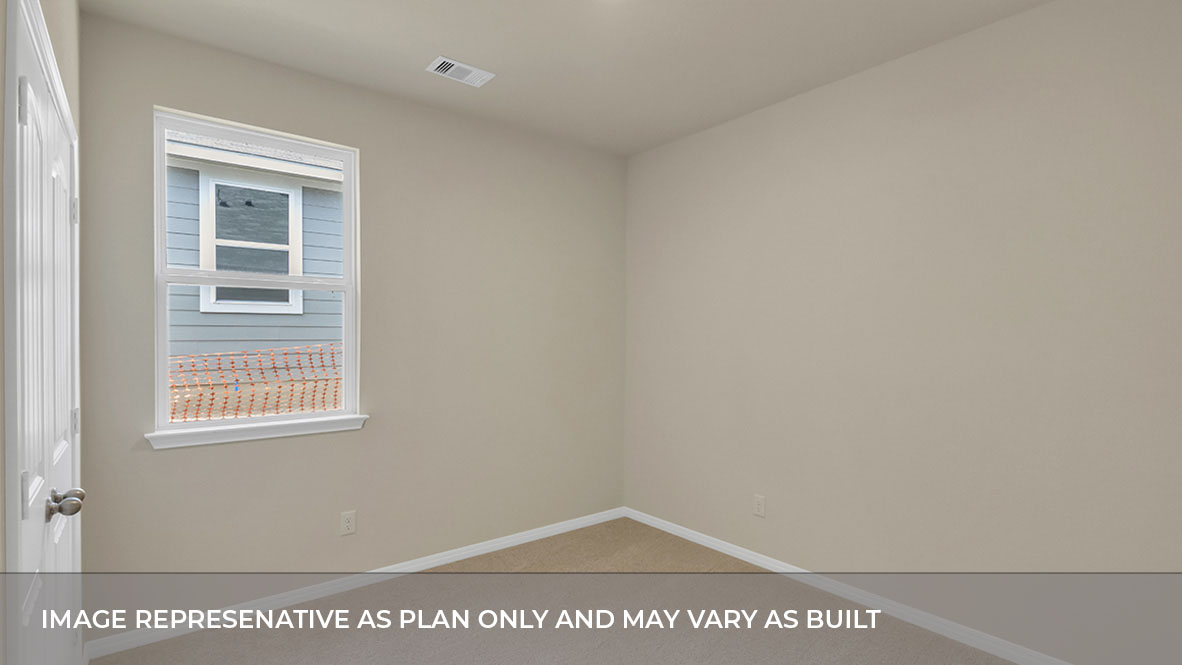 193 Balmorhea Street Kyle, TX 78640 - Photo 14 of 29 a view of an empty room and a window