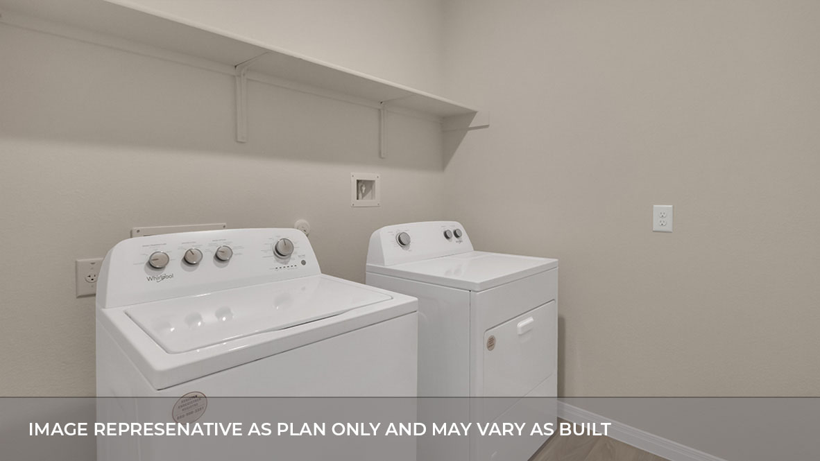 193 Balmorhea Street Kyle, TX 78640 - Photo 14 of 32 a utility room with dryer and washer