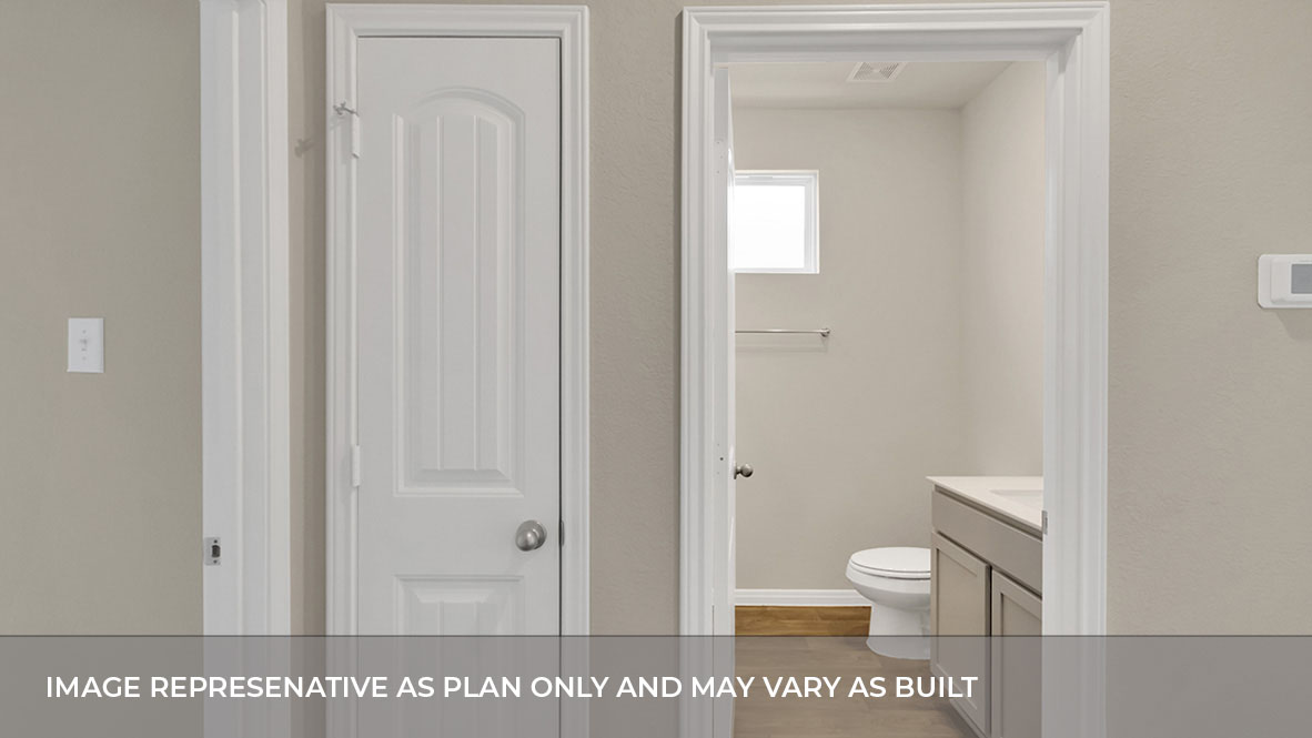 193 Balmorhea Street Kyle, TX 78640 - Photo 4 of 32 a bathroom with a toilet