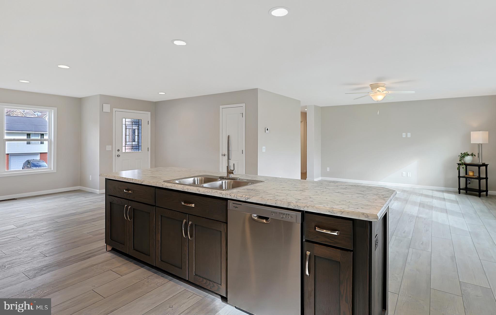 1525 Beacon Street Keyser, WV 26726 - Photo 12 of 67 a spacious bathroom with a granite countertop sink and a mirror