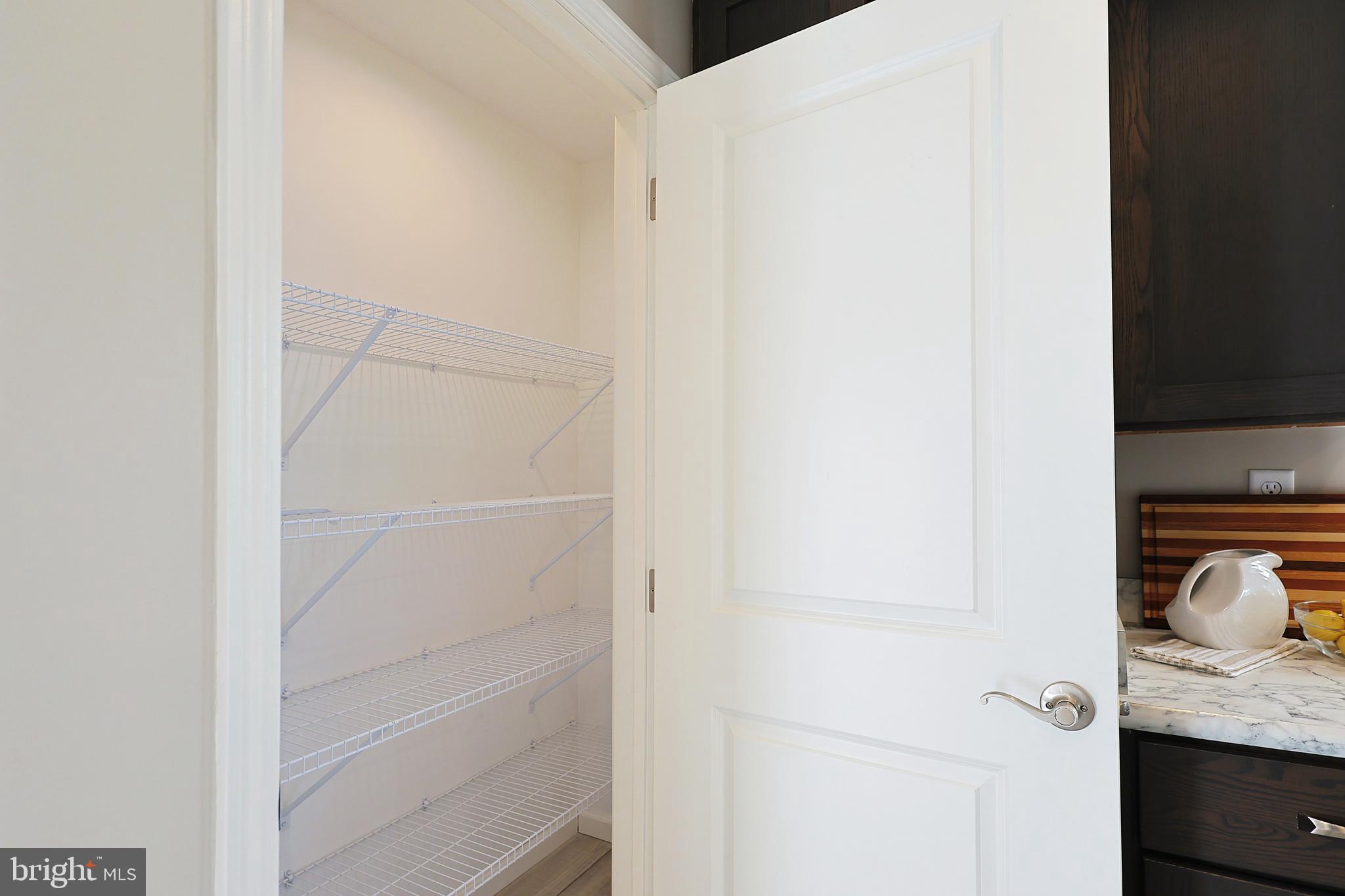 1525 Beacon Street Keyser, WV 26726 - Photo 19 of 67 a view of walk in closet with clothes