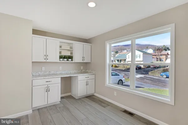 a view of a room with racks on the wall