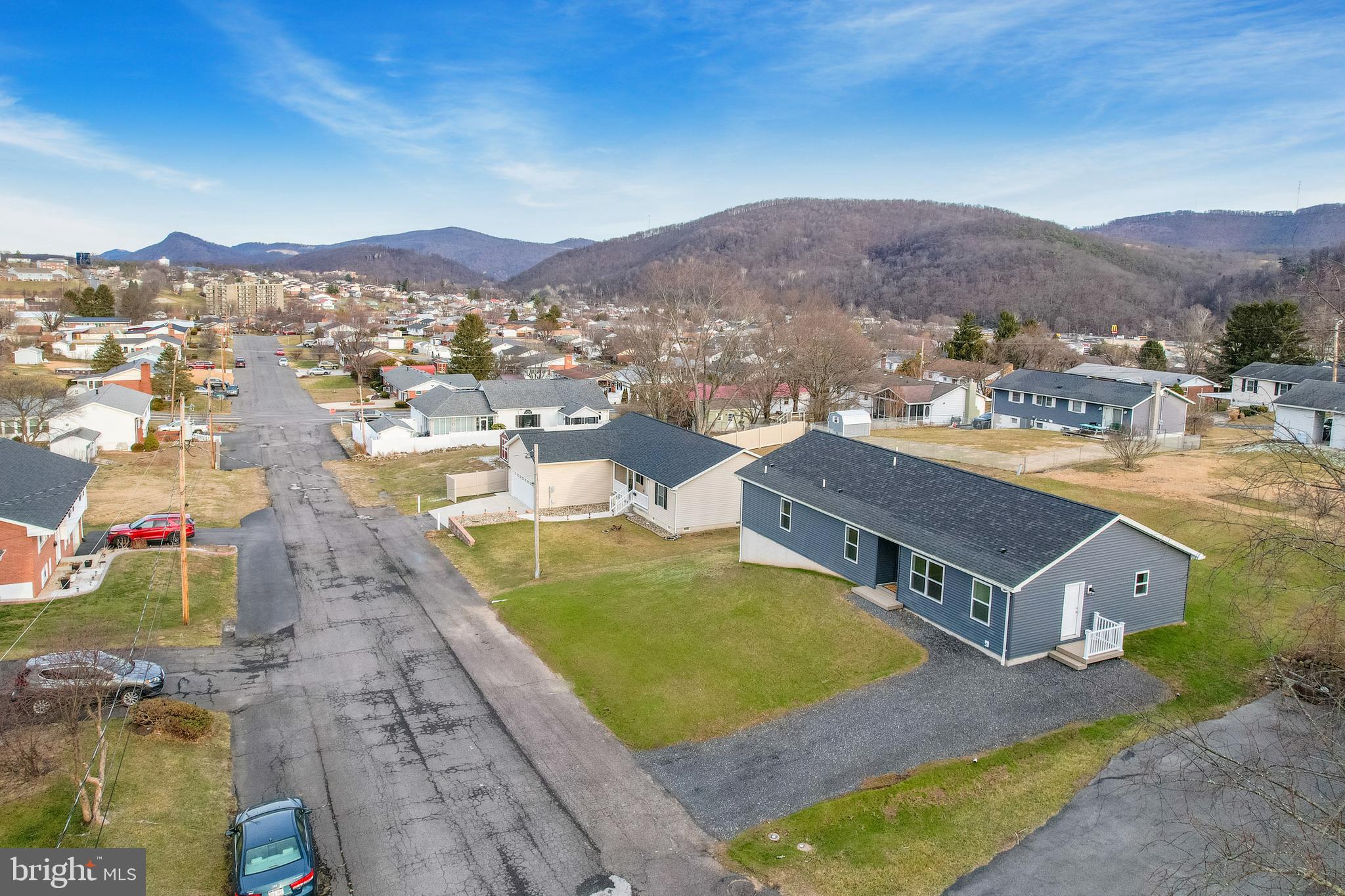 1525 Beacon Street Keyser, WV 26726 - Photo 3 of 59 an aerial view of a house with a mountain