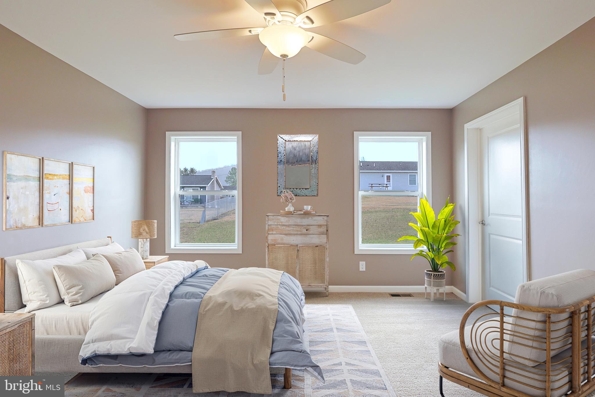 1525 Beacon Street Keyser, WV 26726 - Photo 31 of 67 a bedroom with a bed and a chandelier