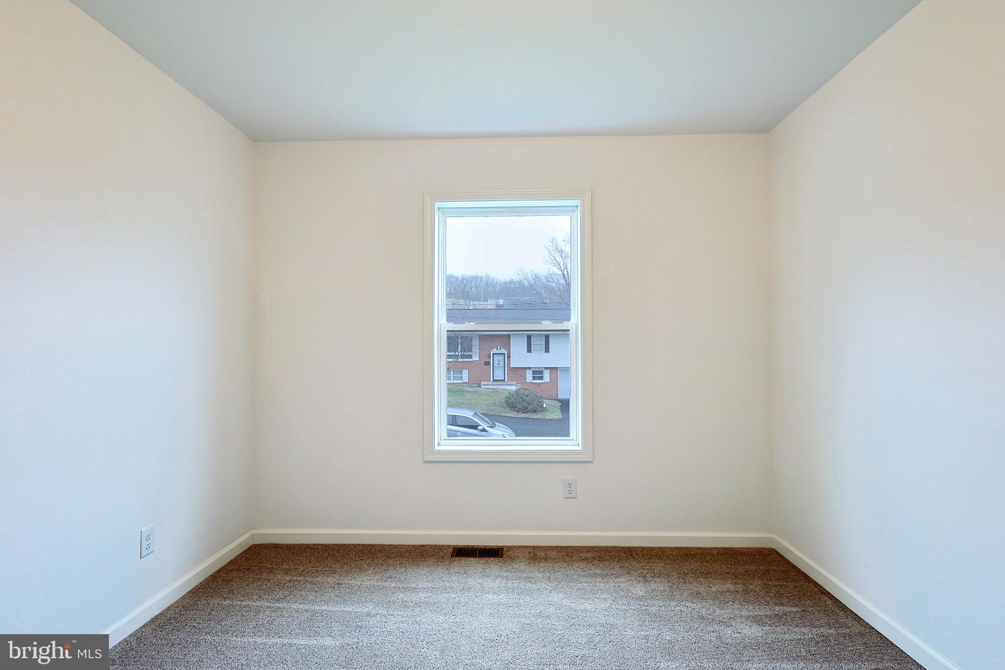 1525 Beacon Street Keyser, WV 26726 - Photo 44 of 67 an empty room with a window