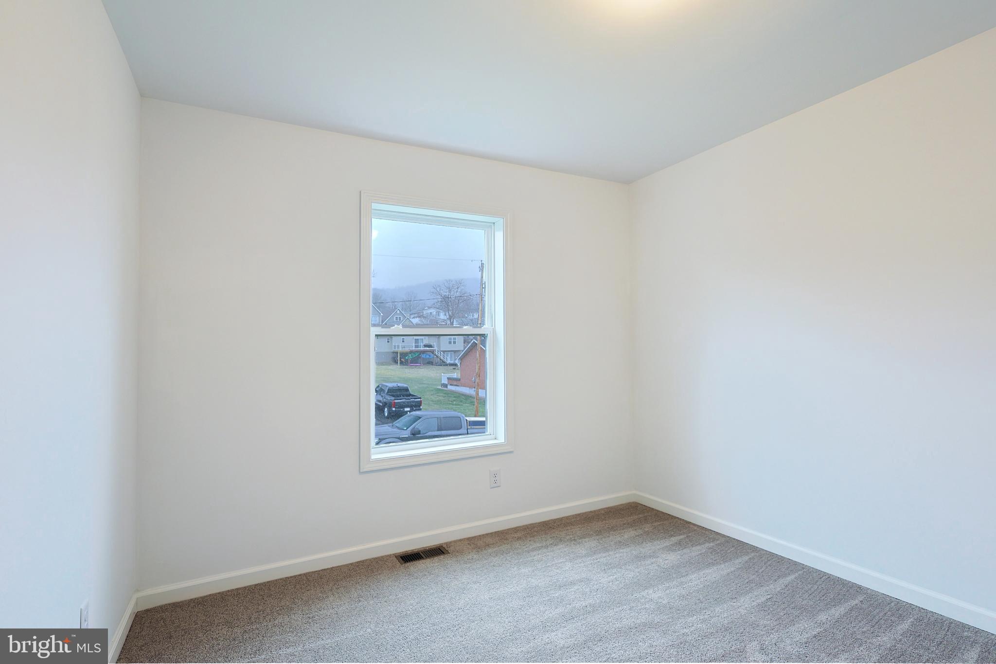 1525 Beacon Street Keyser, WV 26726 - Photo 44 of 59 an empty room with a window