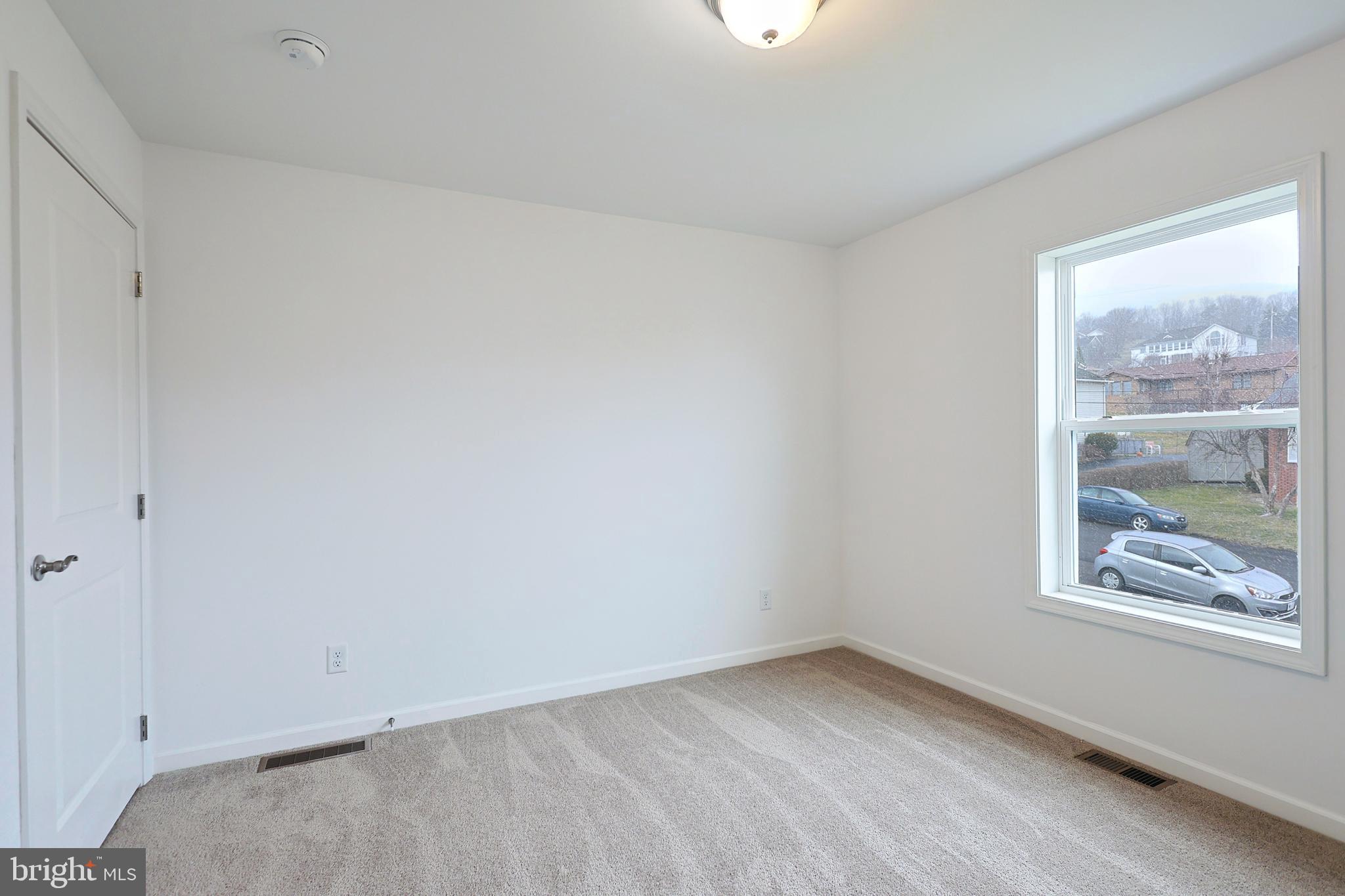1525 Beacon Street Keyser, WV 26726 - Photo 52 of 67 a view of an empty room with a window