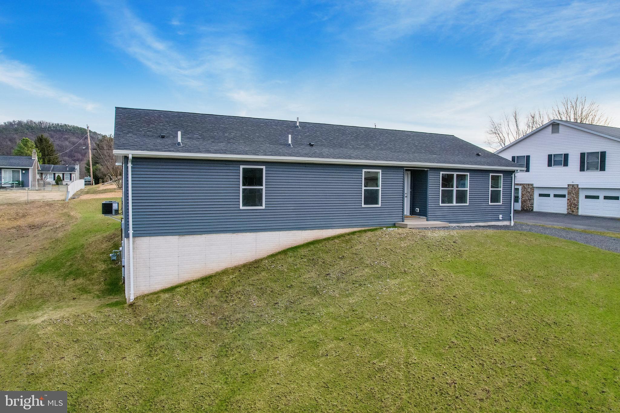 1525 Beacon Street Keyser, WV 26726 - Photo 63 of 67 a front view of a house with a yard