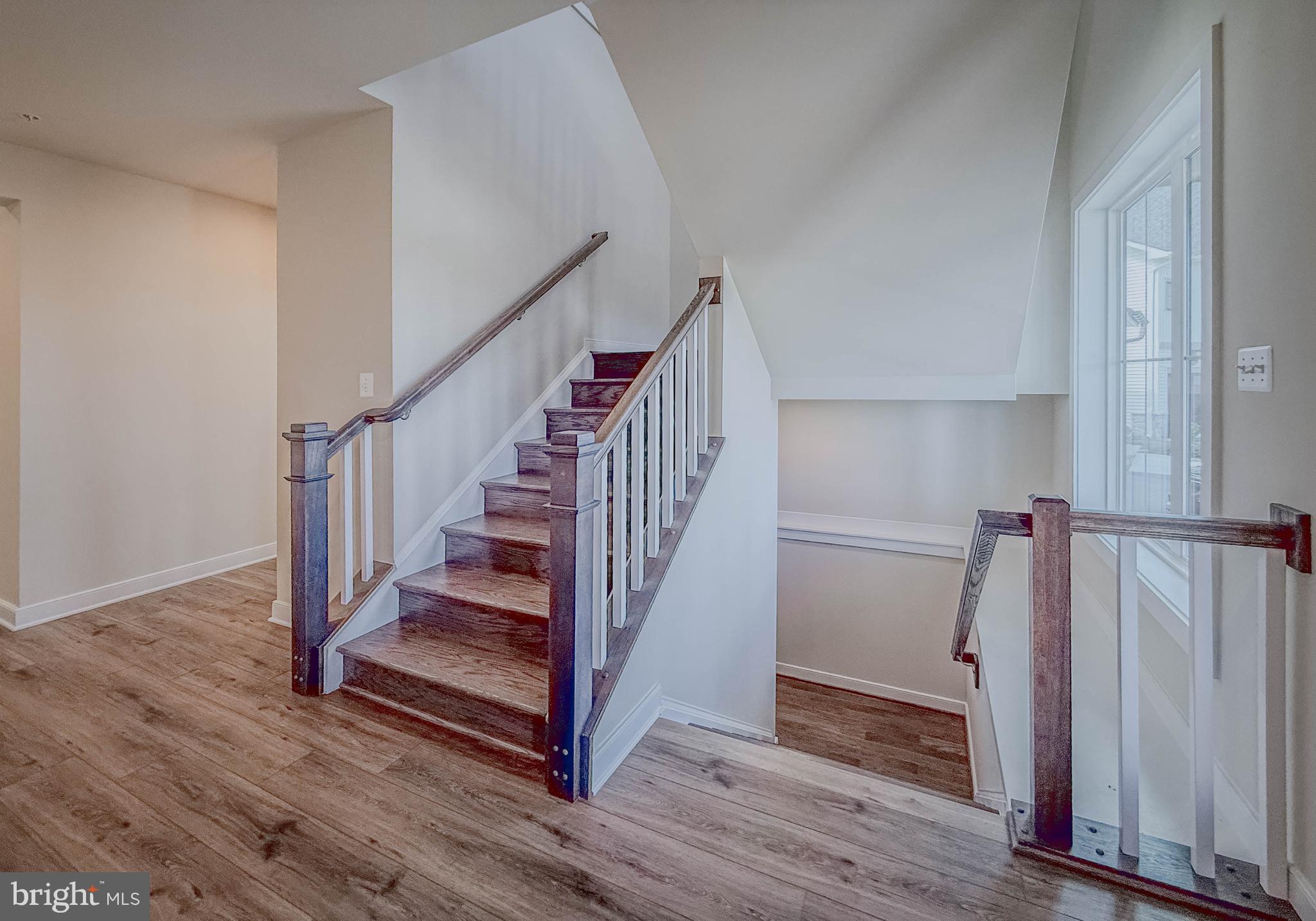 8785 Helleber Spring Circle Frederick, MD 21701 - Photo 11 of 49 a view of entryway with wooden floor