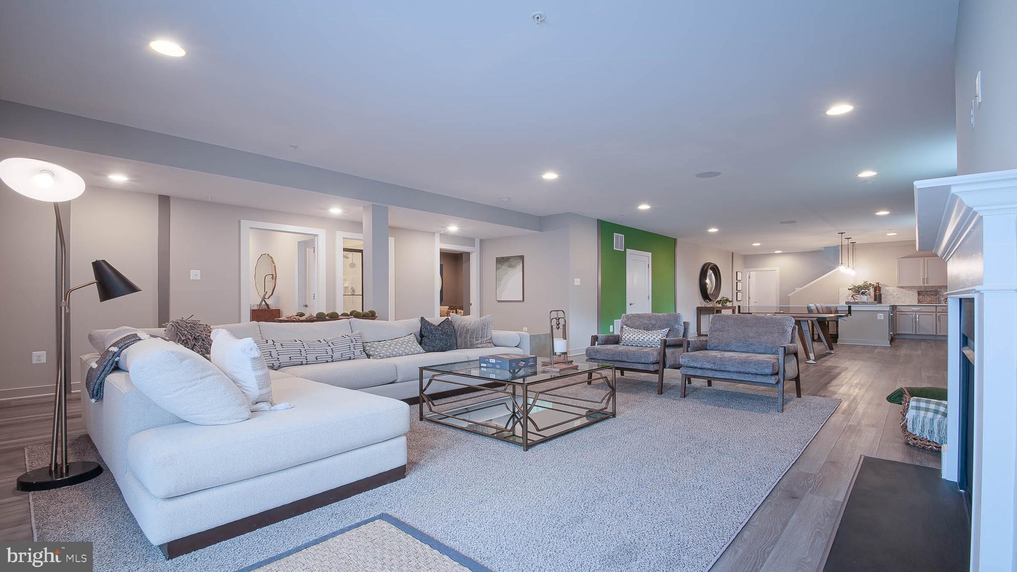 8785 Helleber Spring Circle Frederick, MD 21701 - Photo 19 of 22 a living room with furniture and a large window