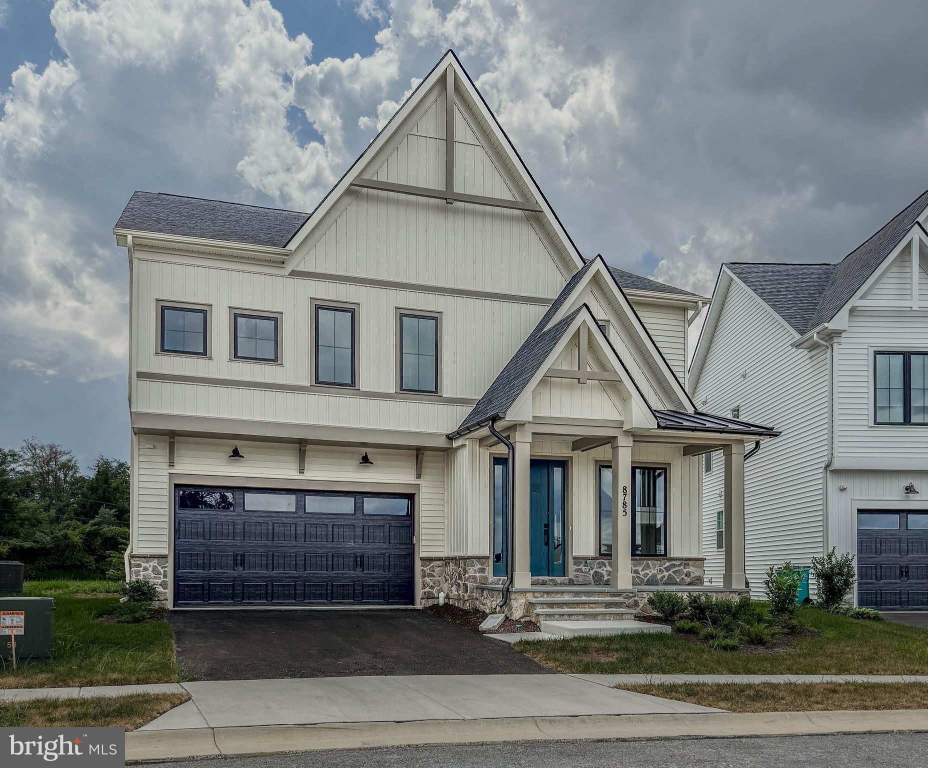 8785 Helleber Spring Circle Frederick, MD 21701 - Photo 2 of 49 a front view of a house