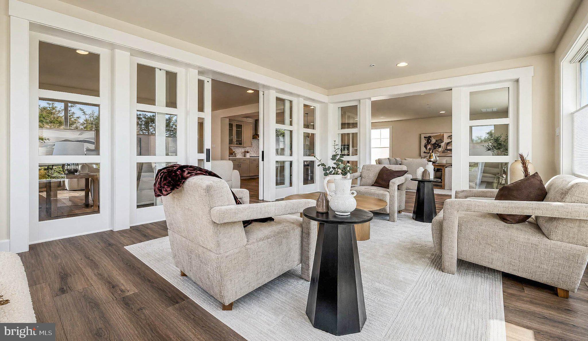 8785 Helleber Spring Circle Frederick, MD 21701 - Photo 22 of 49 a living room with furniture and a large window