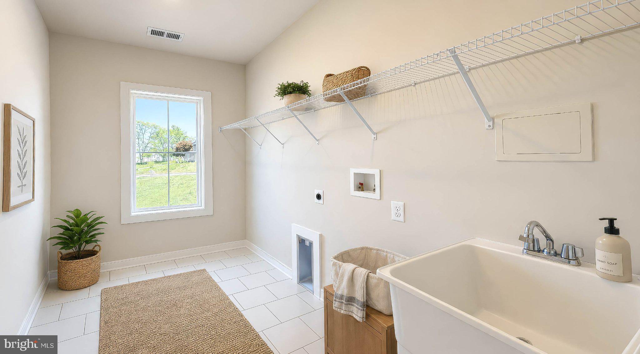 8785 Helleber Spring Circle Frederick, MD 21701 - Photo 39 of 49 Bright and airy laundry retreat.