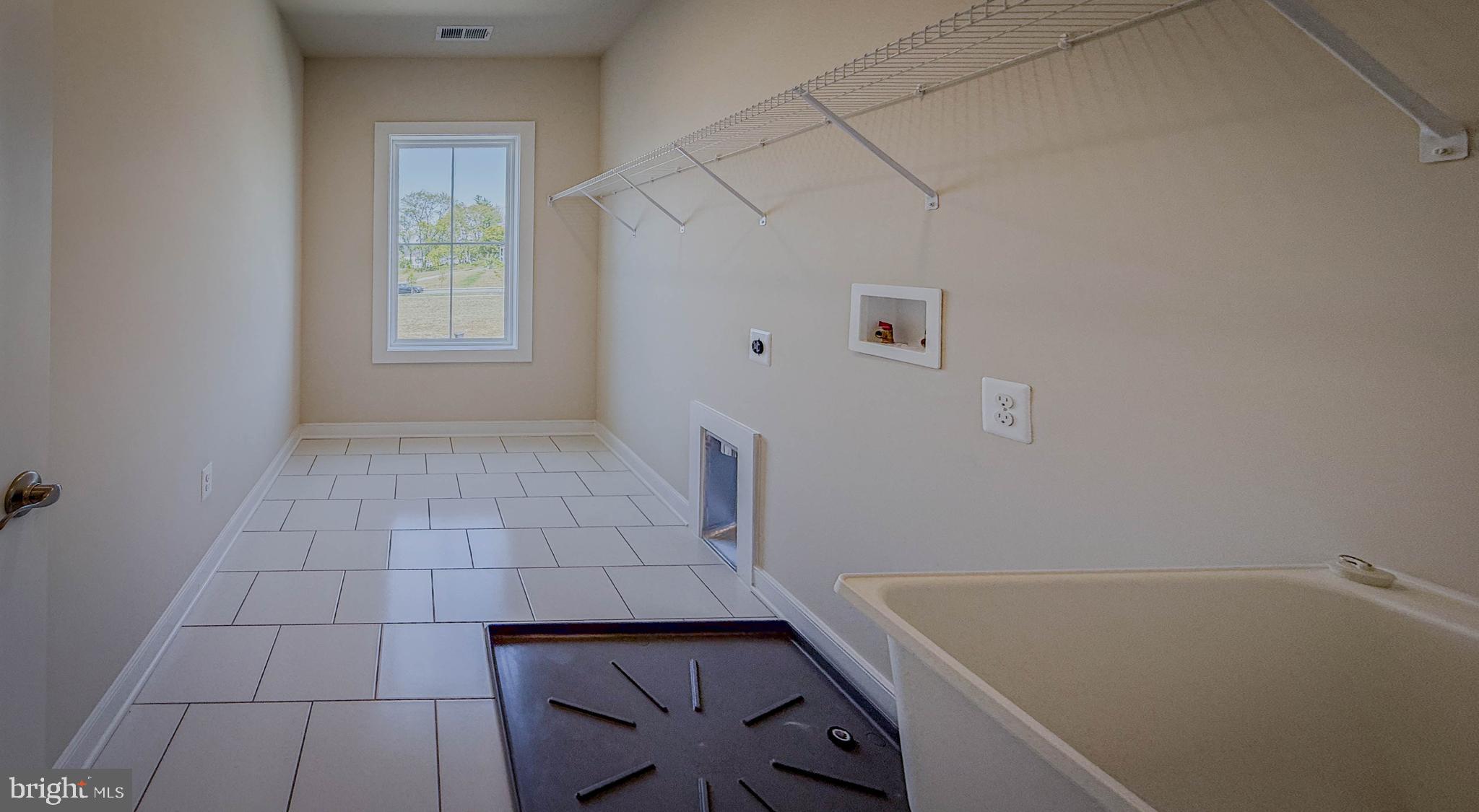 8785 Helleber Spring Circle Frederick, MD 21701 - Photo 40 of 49 Subject Property - extended Laundry Rm-Laundry Tub