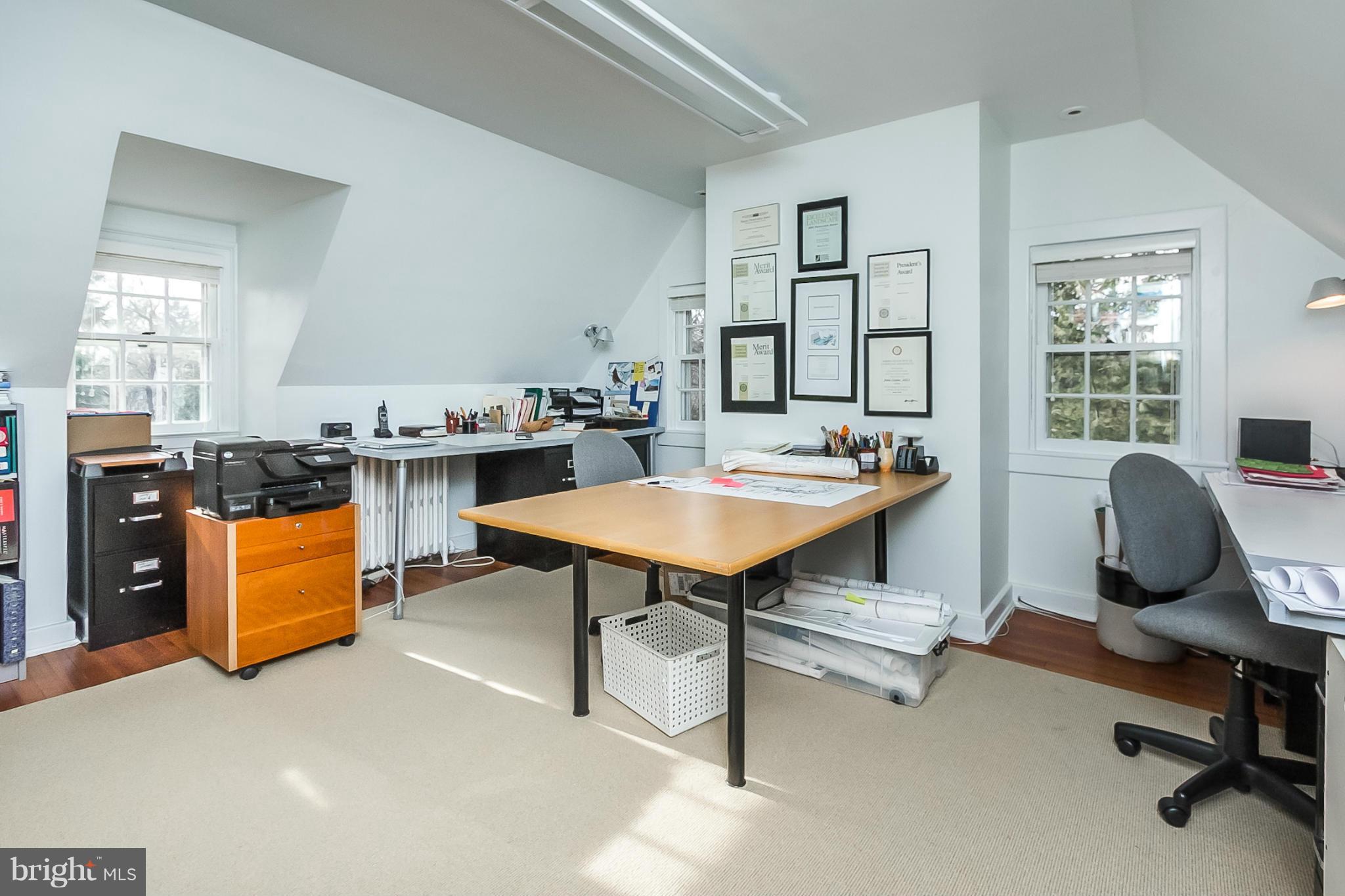 921 Bellemore Road Baltimore, MD 21210 - Photo 22 of 26 a view of a workspace with furniture and a window