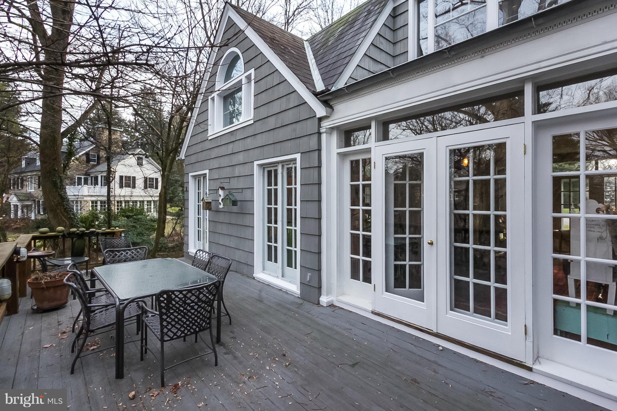 921 Bellemore Road Baltimore, MD 21210 - Photo 25 of 26 a view of a building with a table and chairs