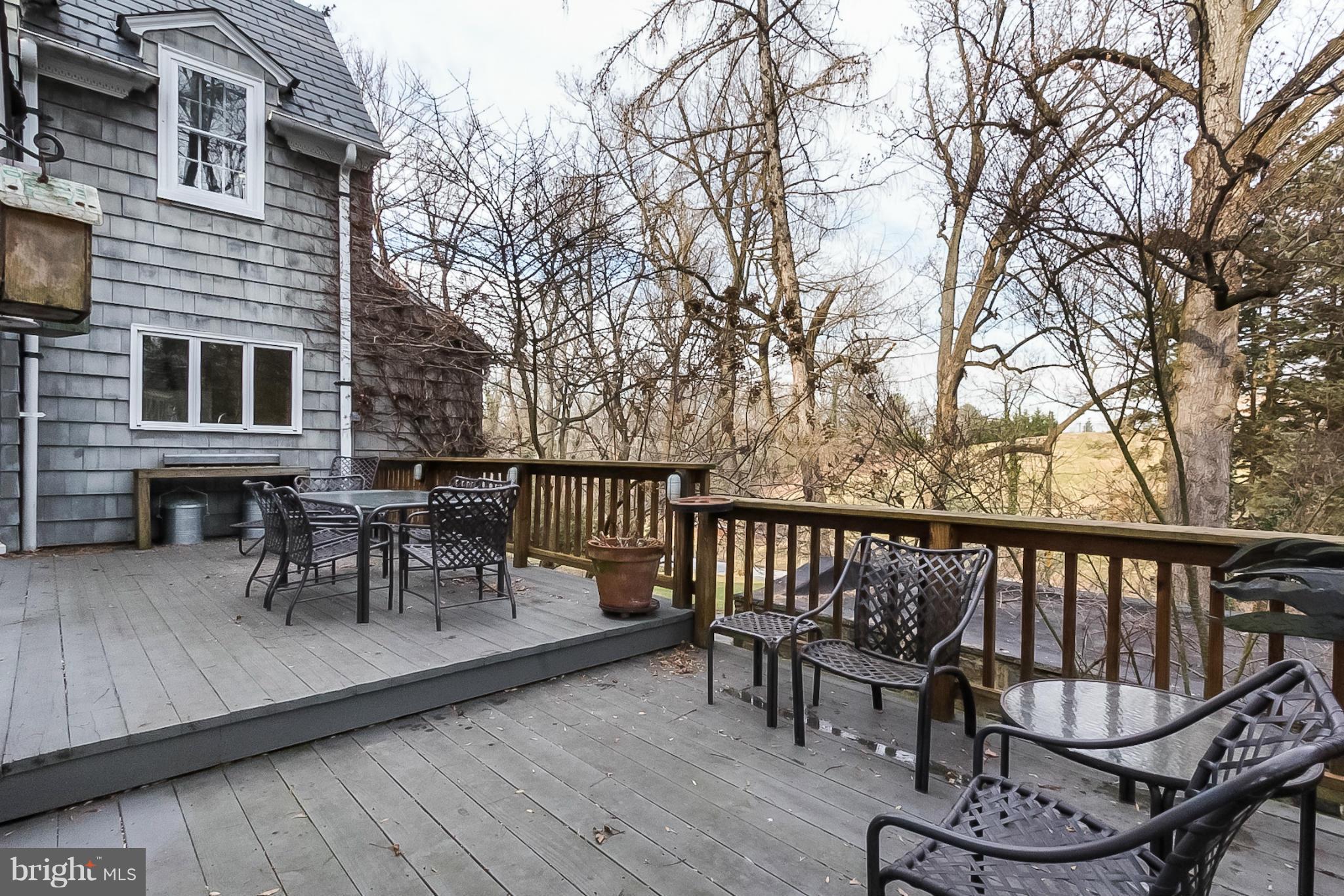 921 Bellemore Road Baltimore, MD 21210 - Photo 26 of 26 a view of a chairs and table on the roof deck