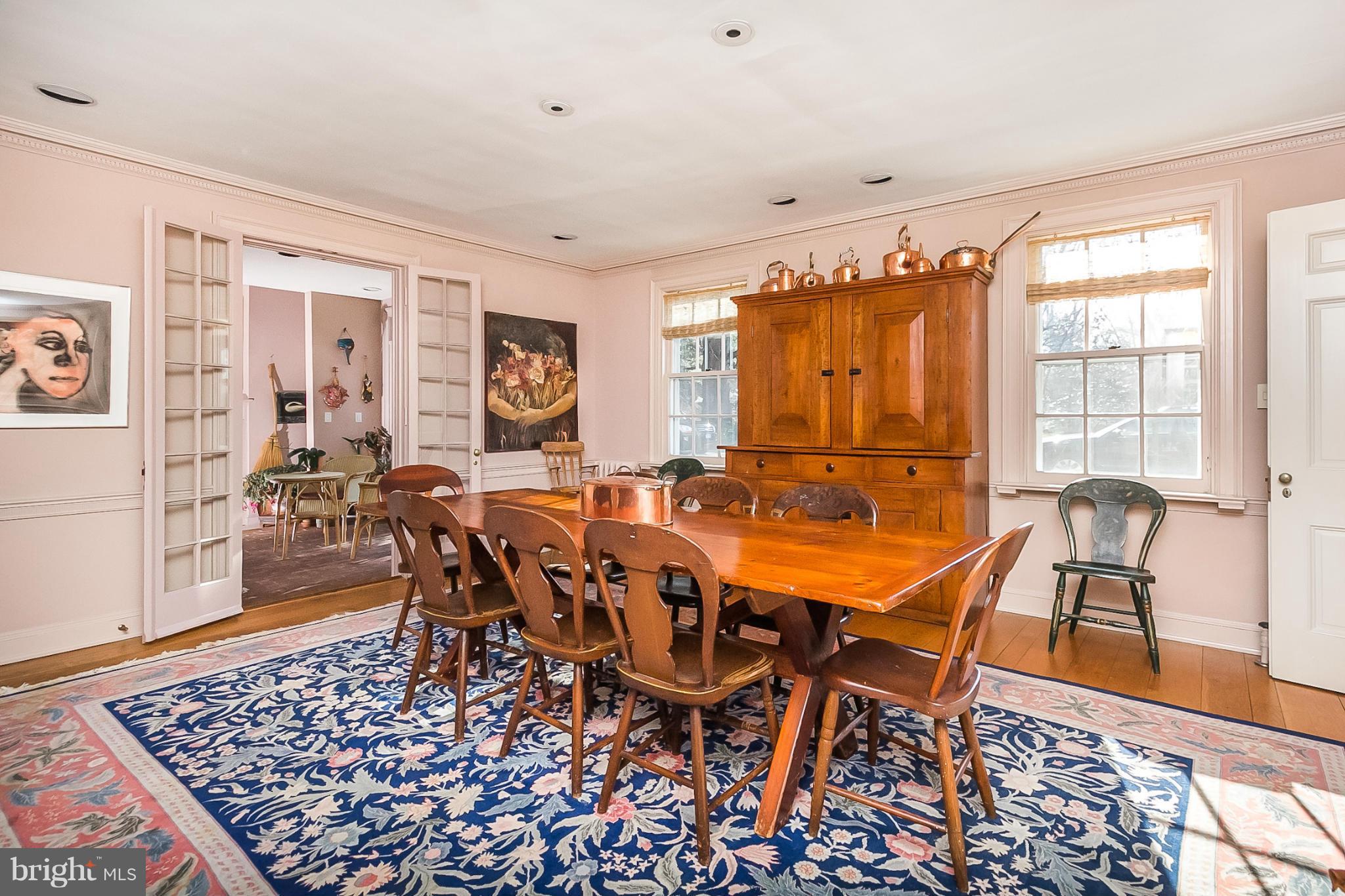 921 Bellemore Road Baltimore, MD 21210 - Photo 6 of 26 a view of a dining room with furniture window and wooden floor