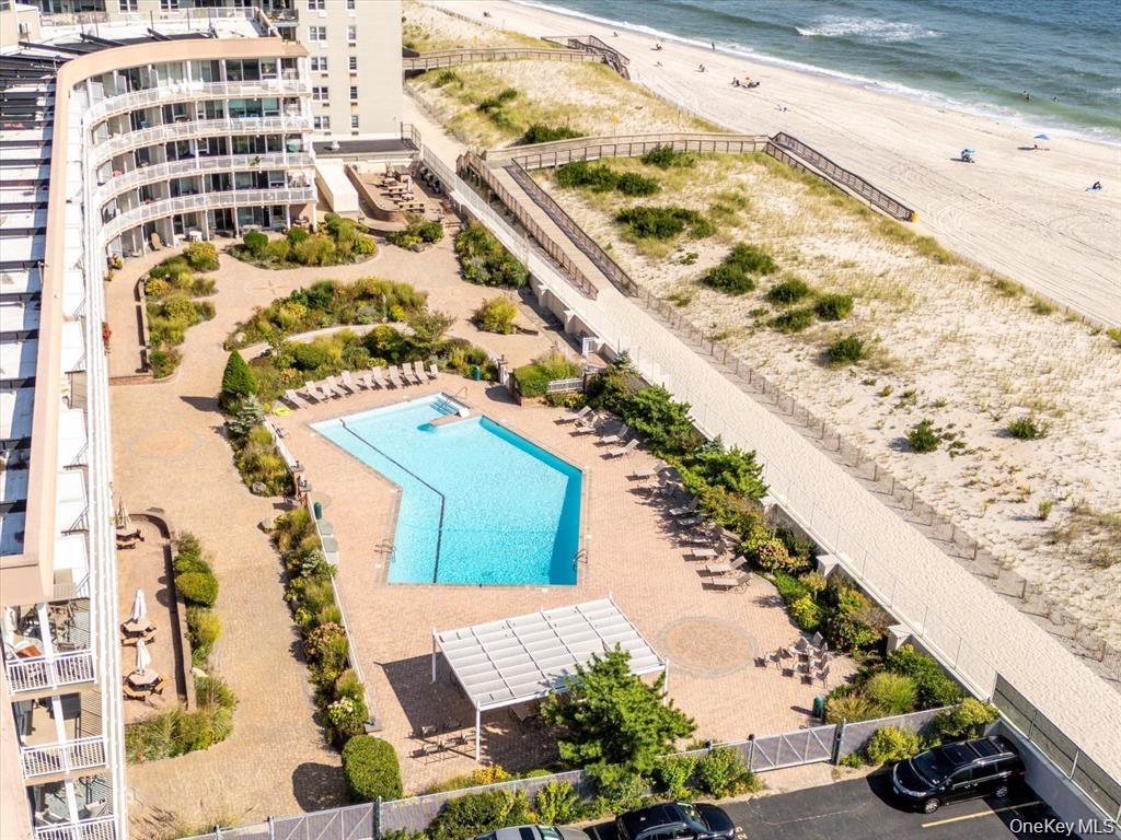 830 Shore Road, Unit 1H Long Beach, NY 11561 - Photo 7 of 23 Ariel view of Pool Deck