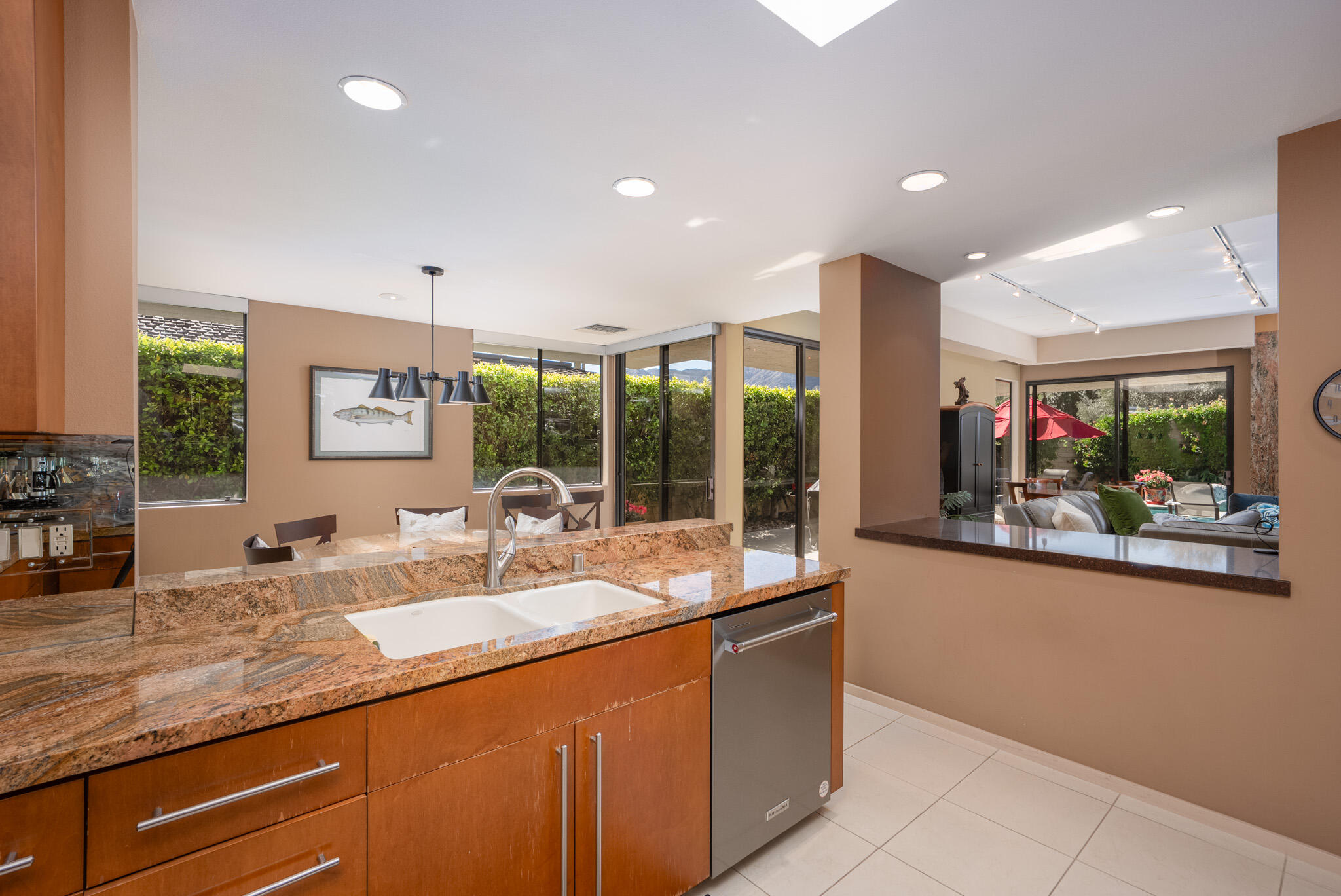 52 Princeton Drive Rancho Mirage, CA 92270 - Photo 14 of 52 a dining hall with stainless steel appliances granite countertop a sink and cabinets