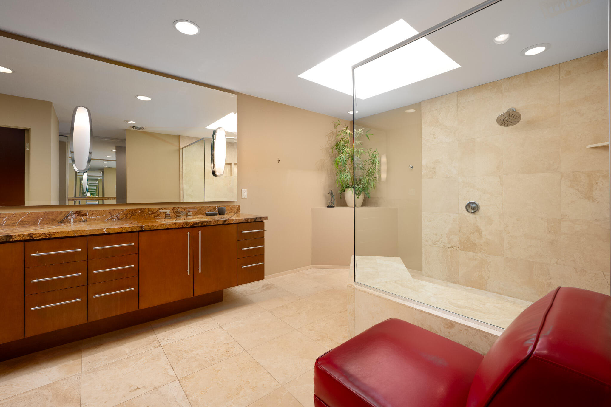 52 Princeton Drive Rancho Mirage, CA 92270 - Photo 19 of 52 a spacious bathroom with a double vanity sink a large mirror and shower