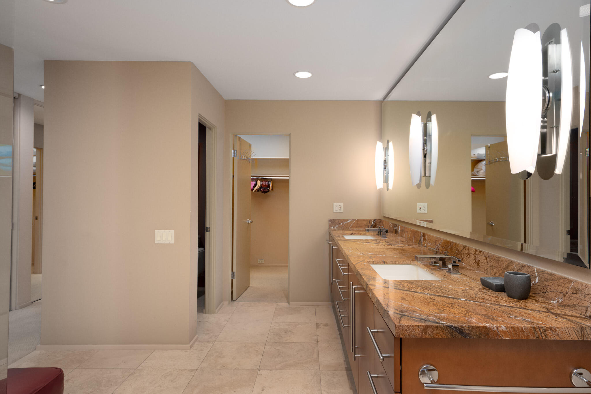 52 Princeton Drive Rancho Mirage, CA 92270 - Photo 21 of 52 a bathroom with a granite countertop sink and a mirror