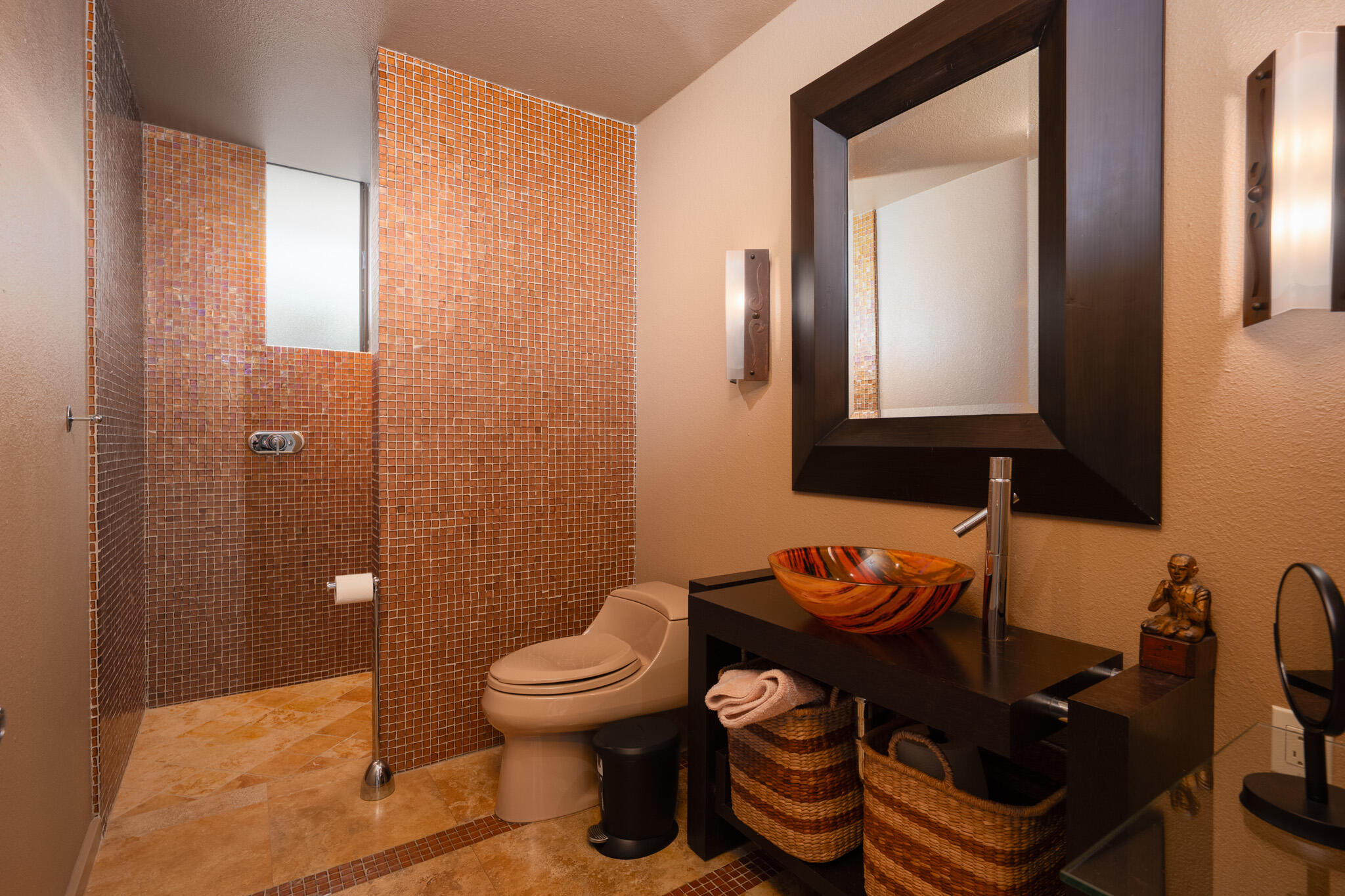 52 Princeton Drive Rancho Mirage, CA 92270 - Photo 28 of 52 a bathroom with a toilet a sink and mirror