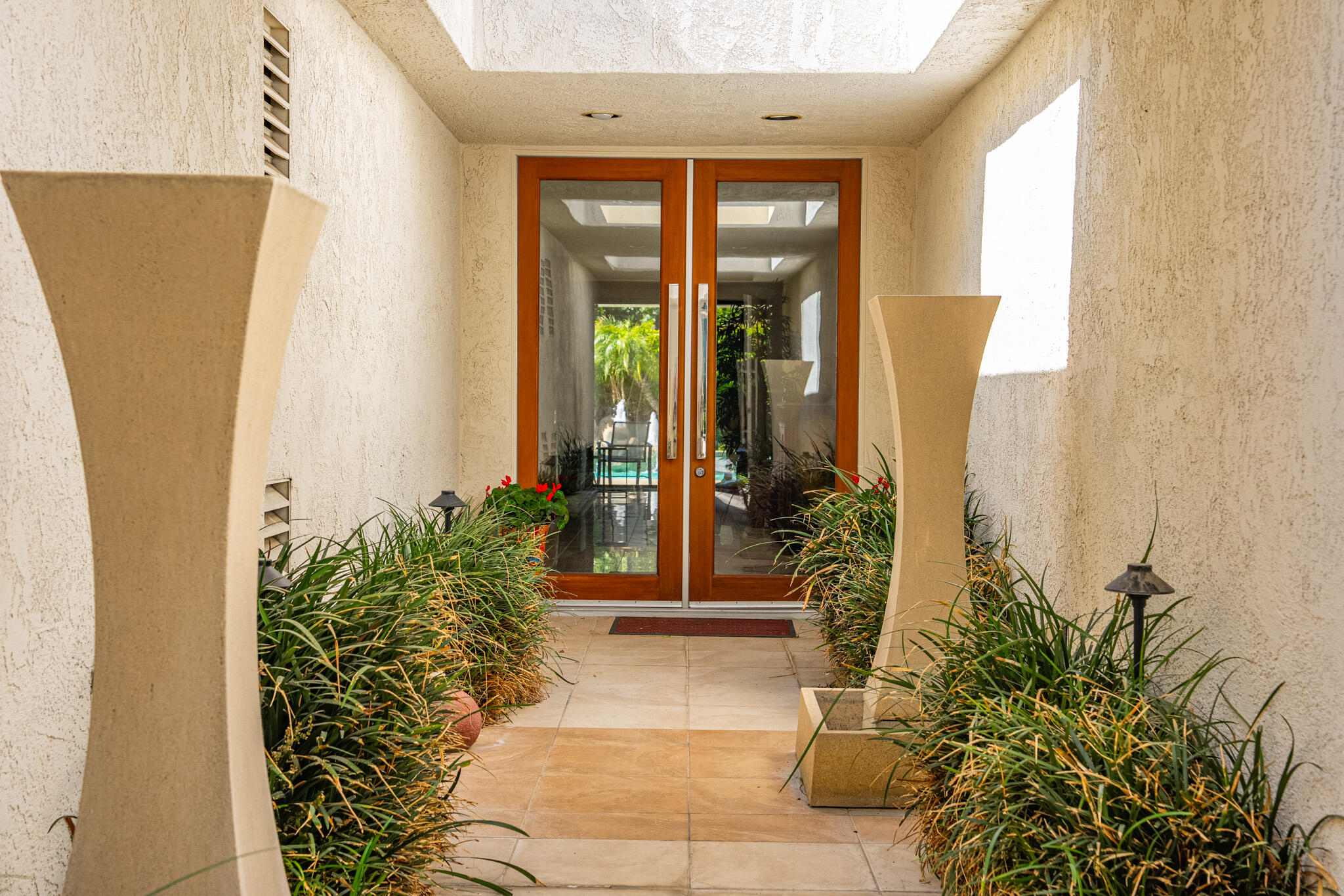 52 Princeton Drive Rancho Mirage, CA 92270 - Photo 3 of 52 a view of a entryway of the house