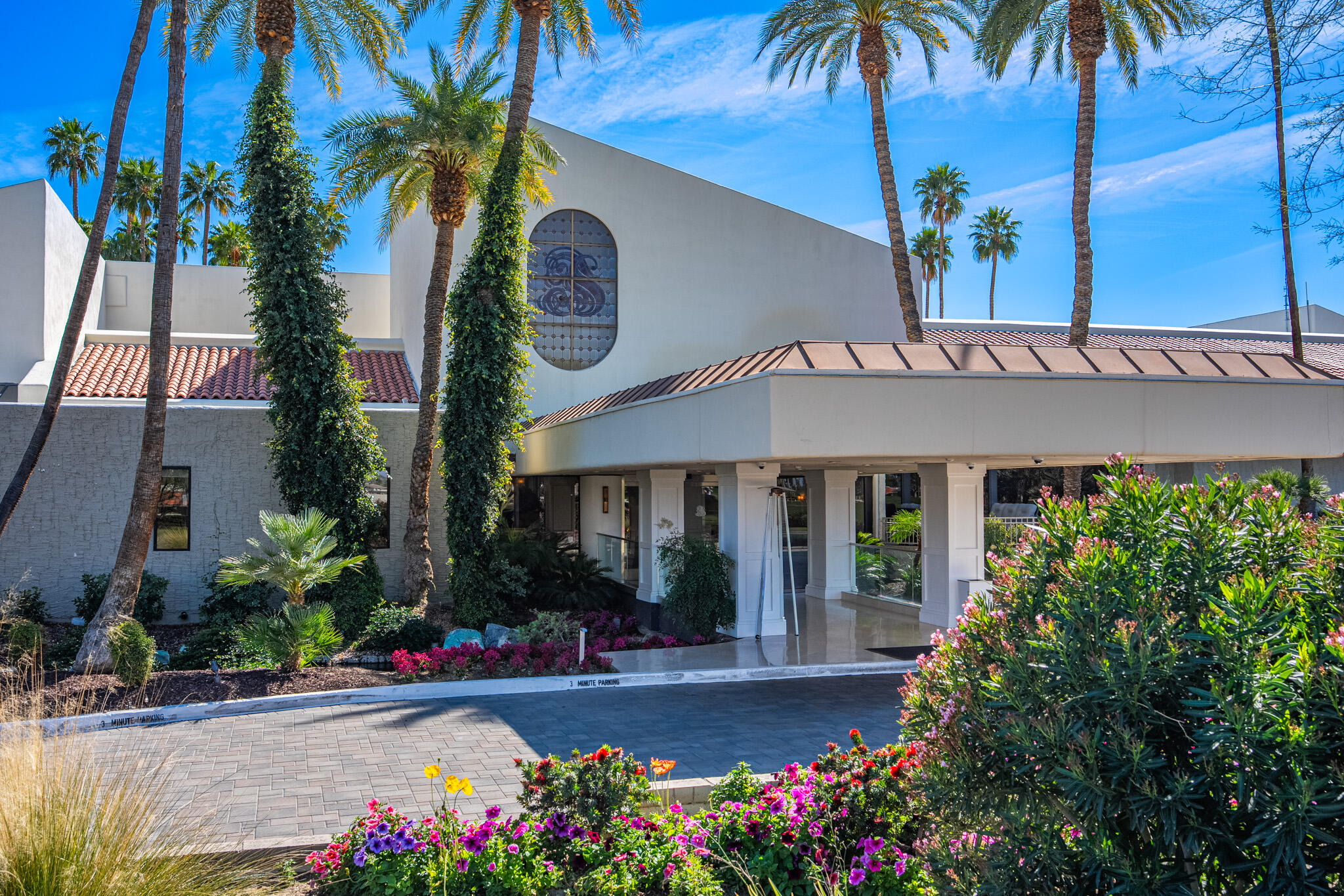 52 Princeton Drive Rancho Mirage, CA 92270 - Photo 44 of 52 a front view of a house with a garden