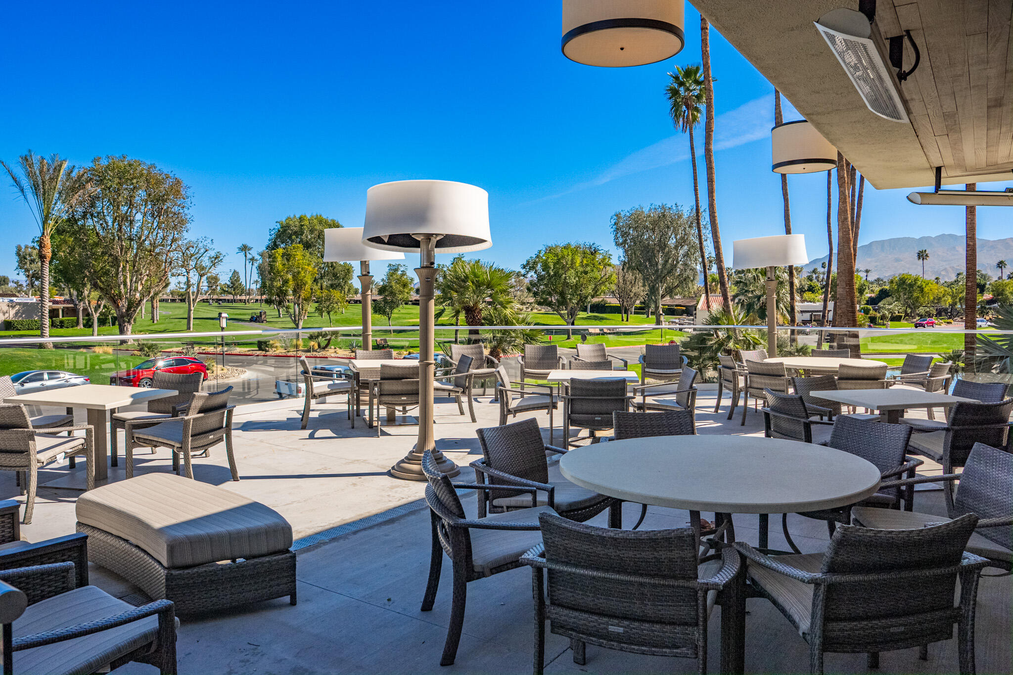 52 Princeton Drive Rancho Mirage, CA 92270 - Photo 46 of 52 a view of a patio with a table chairs and a table