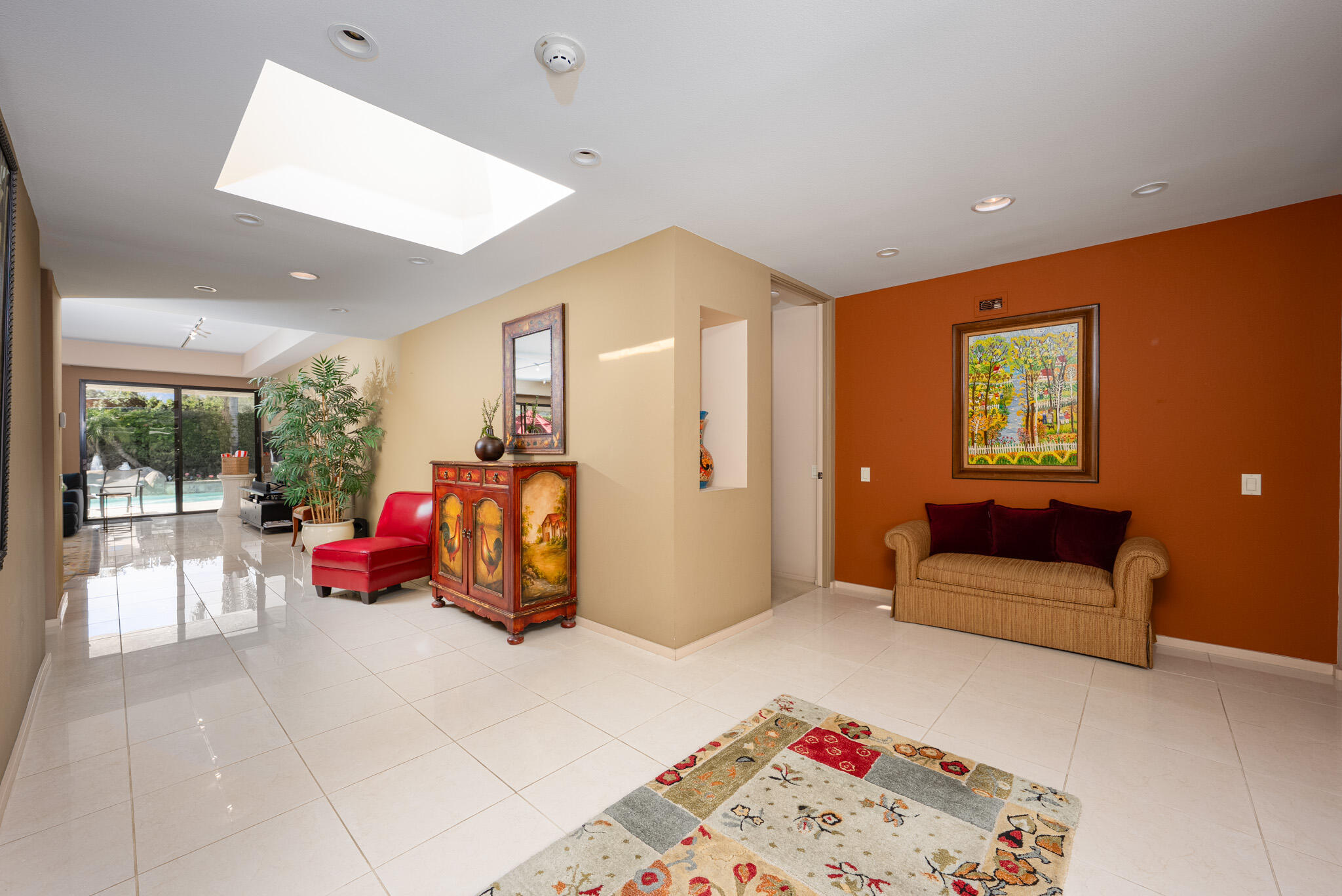 52 Princeton Drive Rancho Mirage, CA 92270 - Photo 5 of 52 a living room with furniture and a flat screen tv