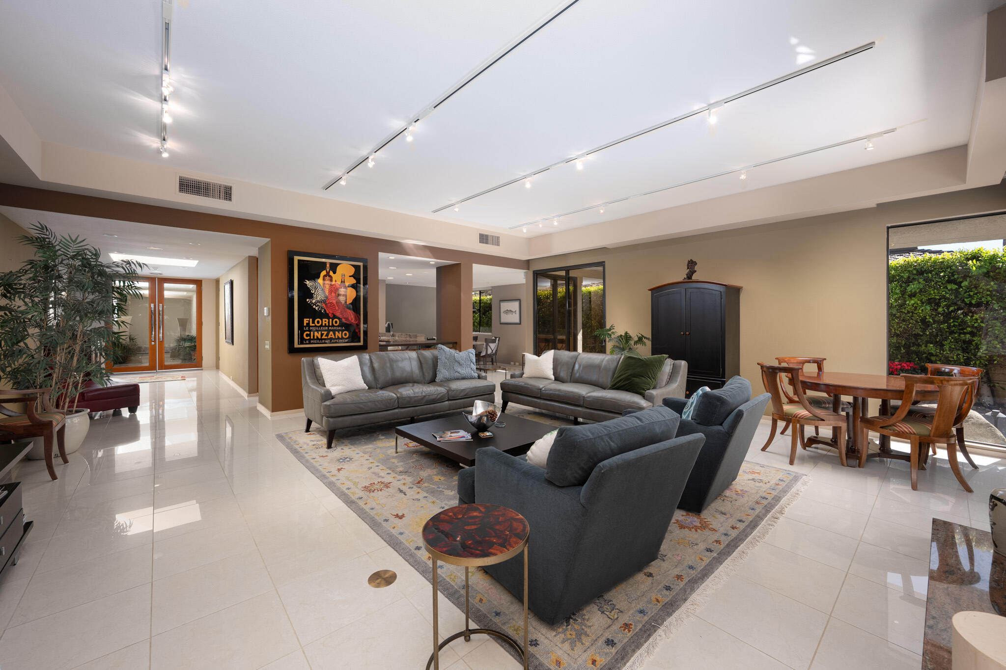 52 Princeton Drive Rancho Mirage, CA 92270 - Photo 7 of 52 a living room with furniture and a flat screen tv