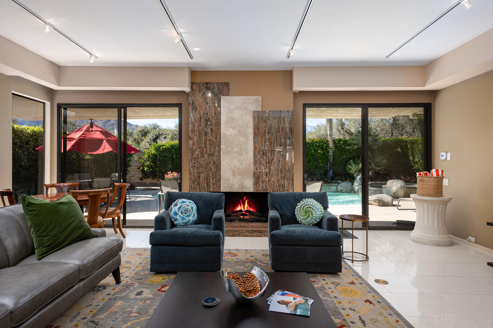 52 Princeton Drive Rancho Mirage, CA 92270 - Photo 10 of 52 a living room with furniture and a flat screen tv