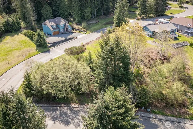 a view of a lake with a house
