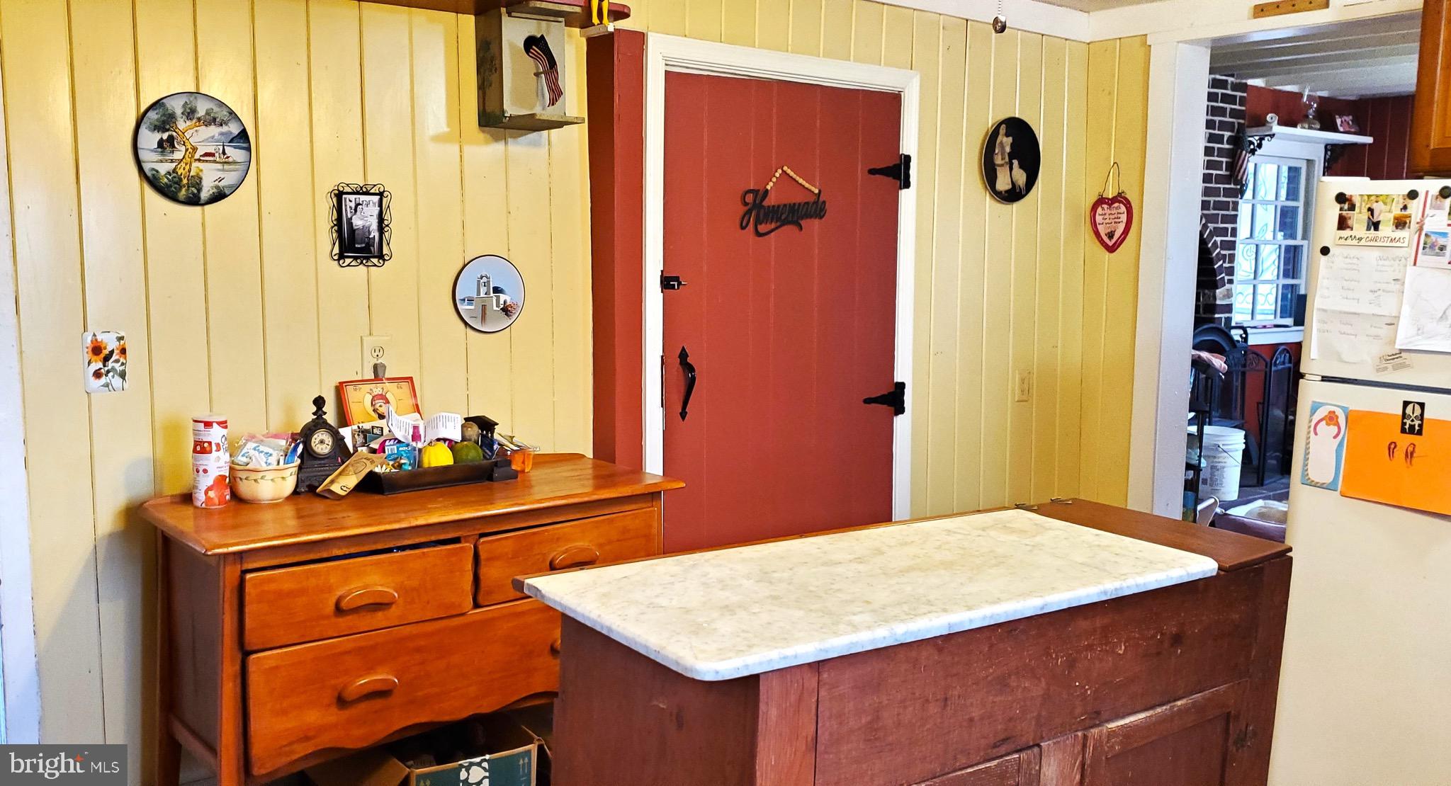 27329 Iron Gate Road Federalsburg, MD 21632 - Photo 26 of 57 a room that has a bed and a table in it