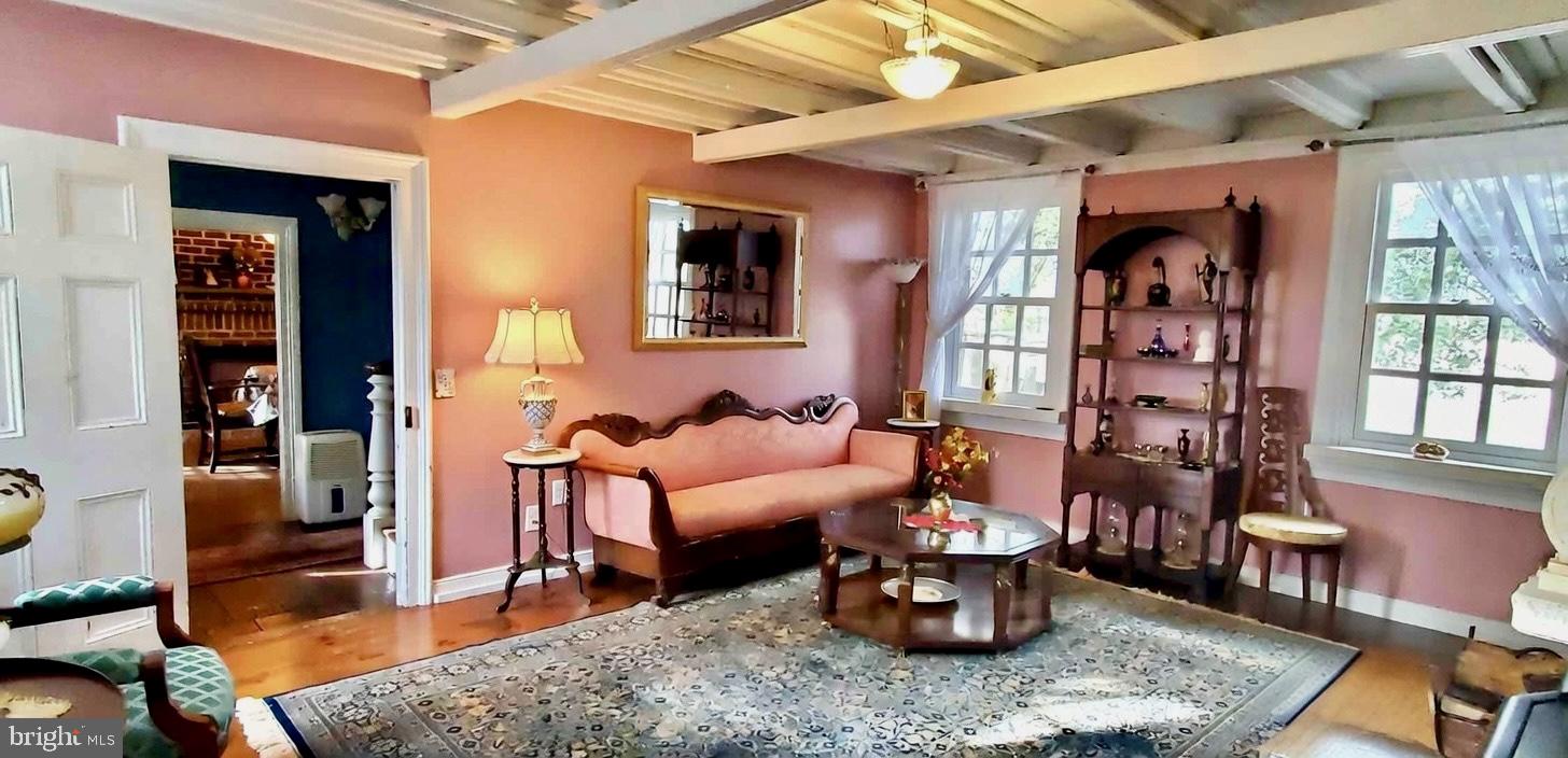 27329 Iron Gate Road Federalsburg, MD 21632 - Photo 37 of 57 a living room with furniture and wooden floor