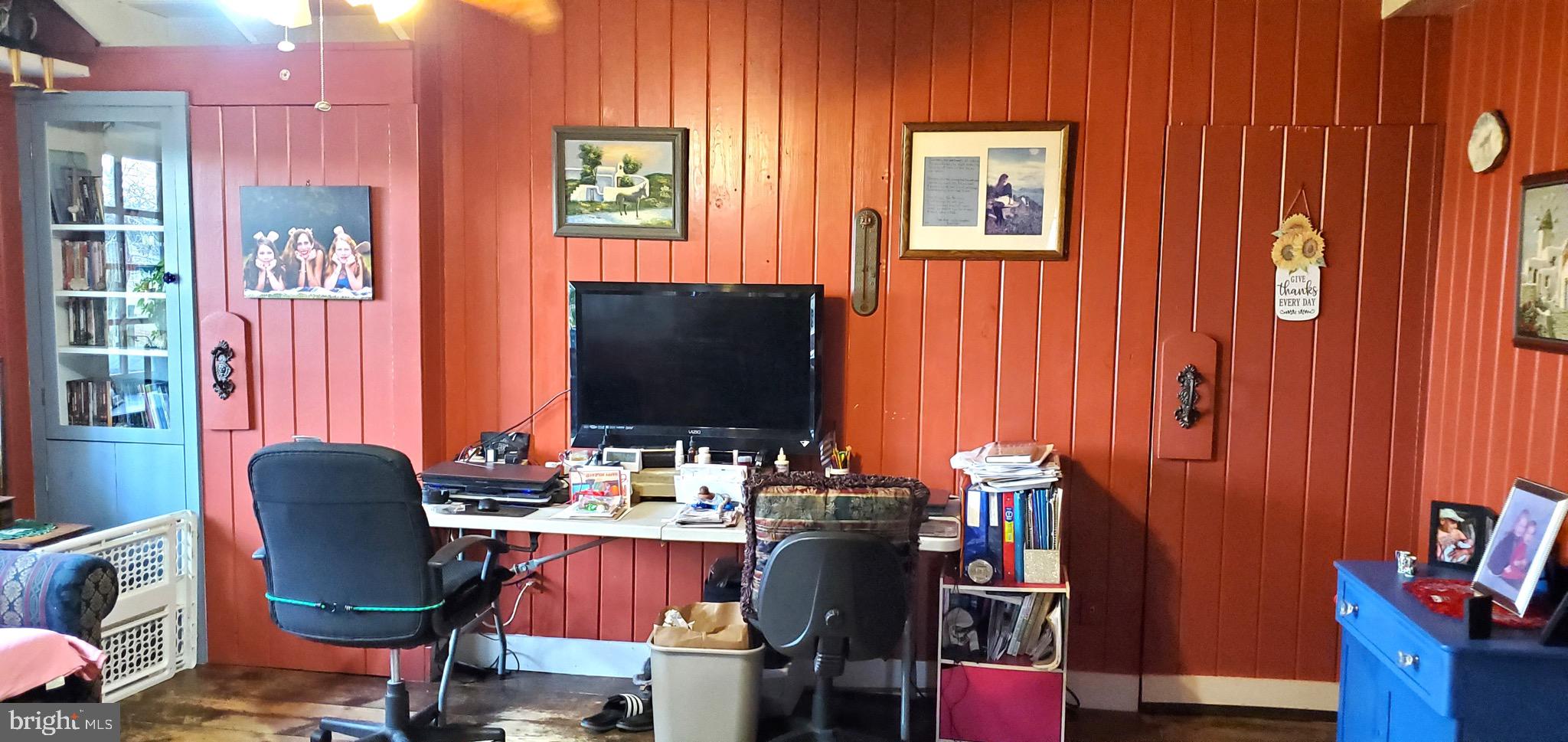 27329 Iron Gate Road Federalsburg, MD 21632 - Photo 42 of 57 a work room with furniture and wooden floor