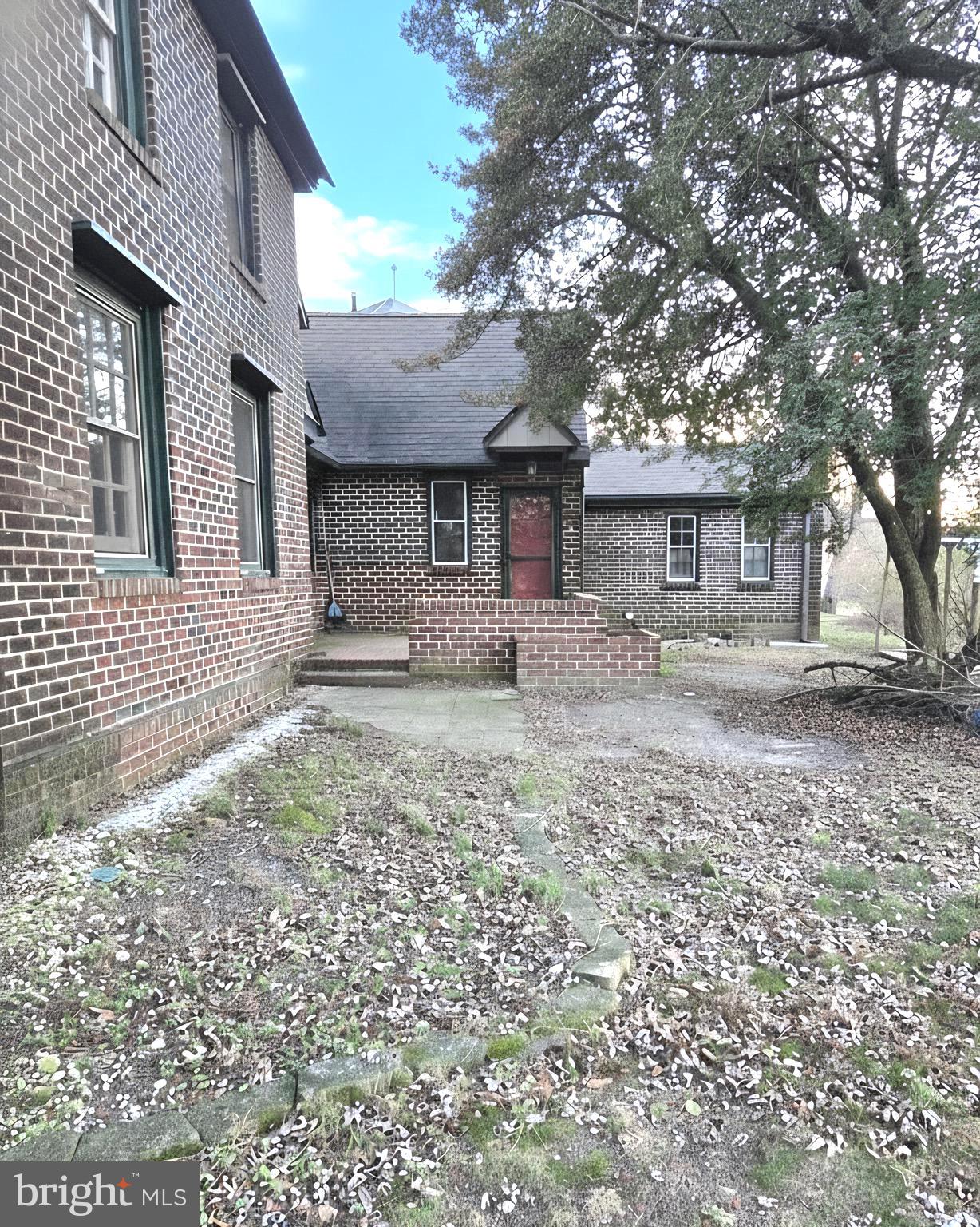 27329 Iron Gate Road Federalsburg, MD 21632 - Photo 5 of 57 a front view of a house with garden