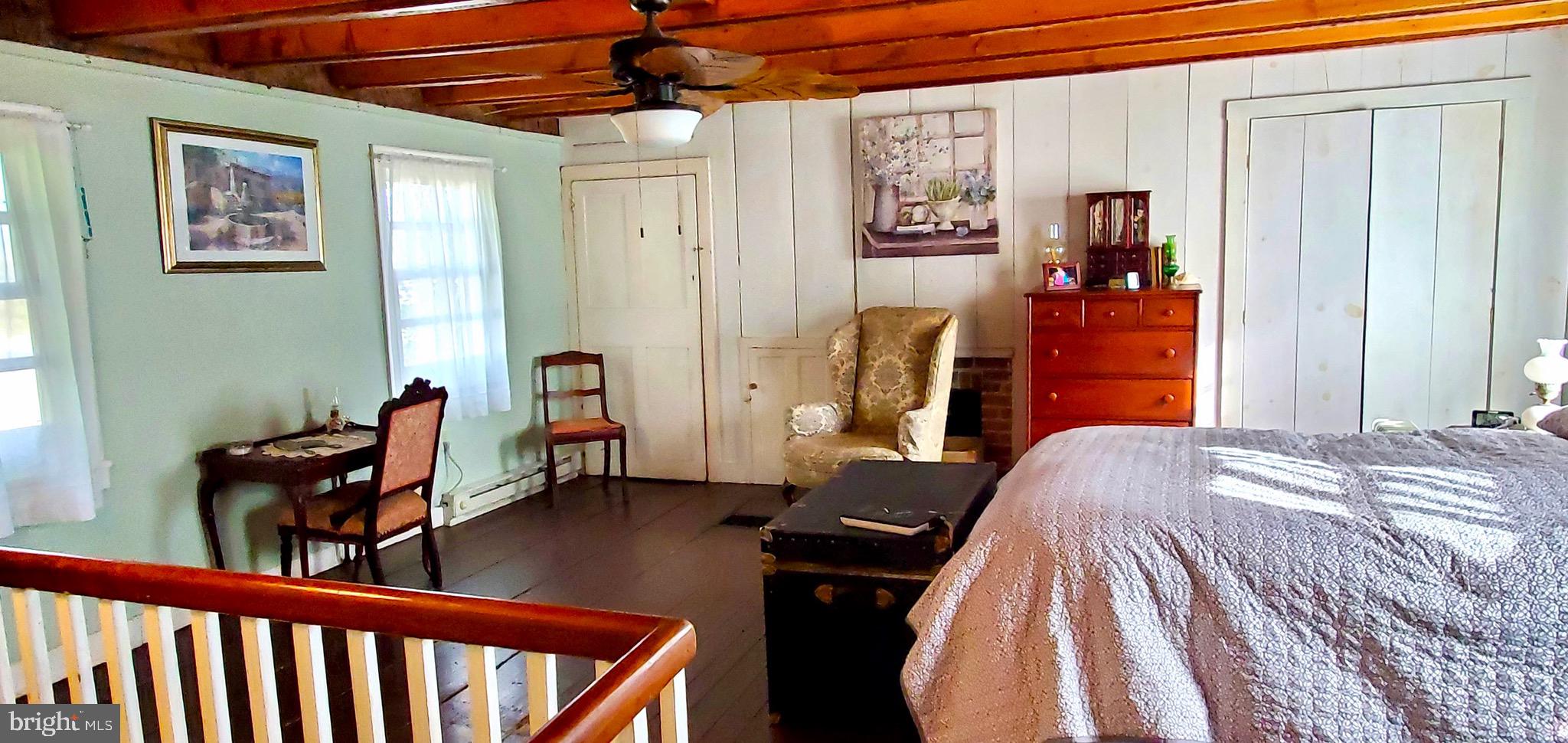 27329 Iron Gate Road Federalsburg, MD 21632 - Photo 55 of 57 a bed room with a bed and furniture