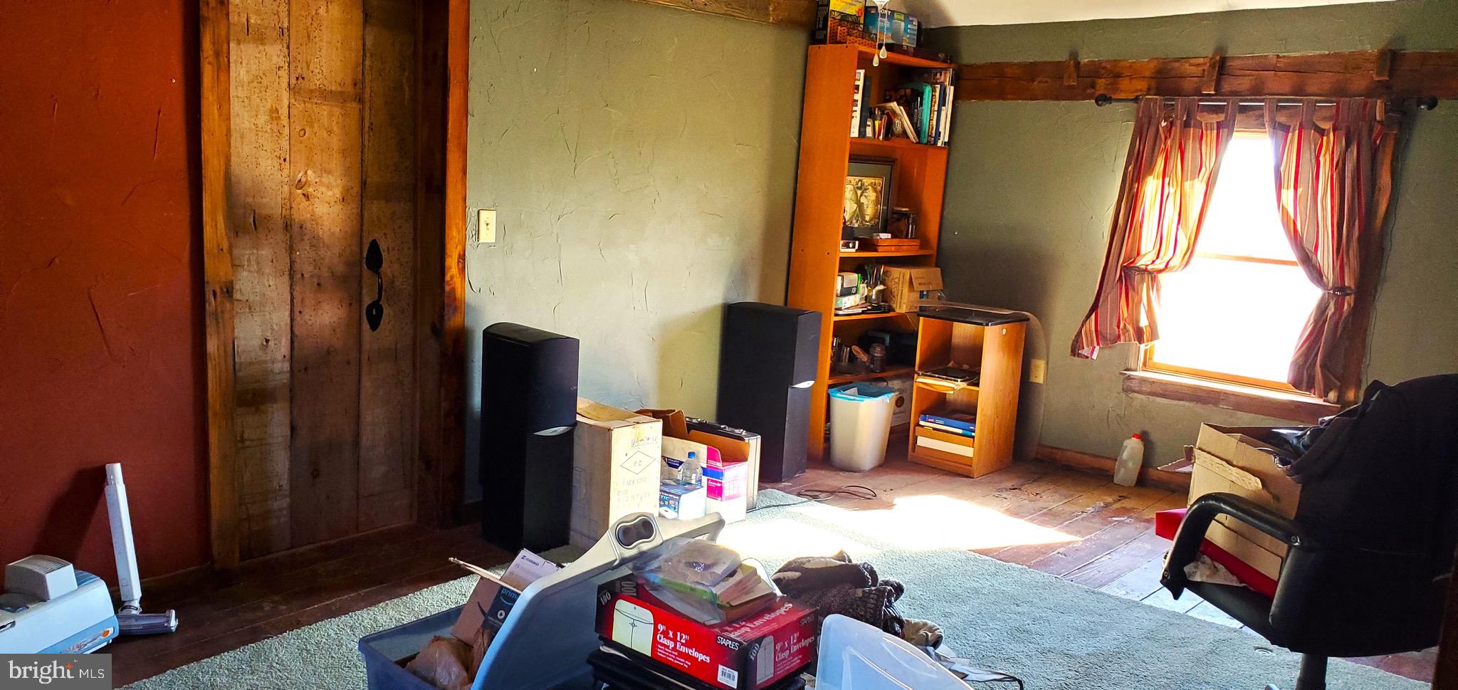 27329 Iron Gate Road Federalsburg, MD 21632 - Photo 10 of 57 a bedroom with a bed and a window