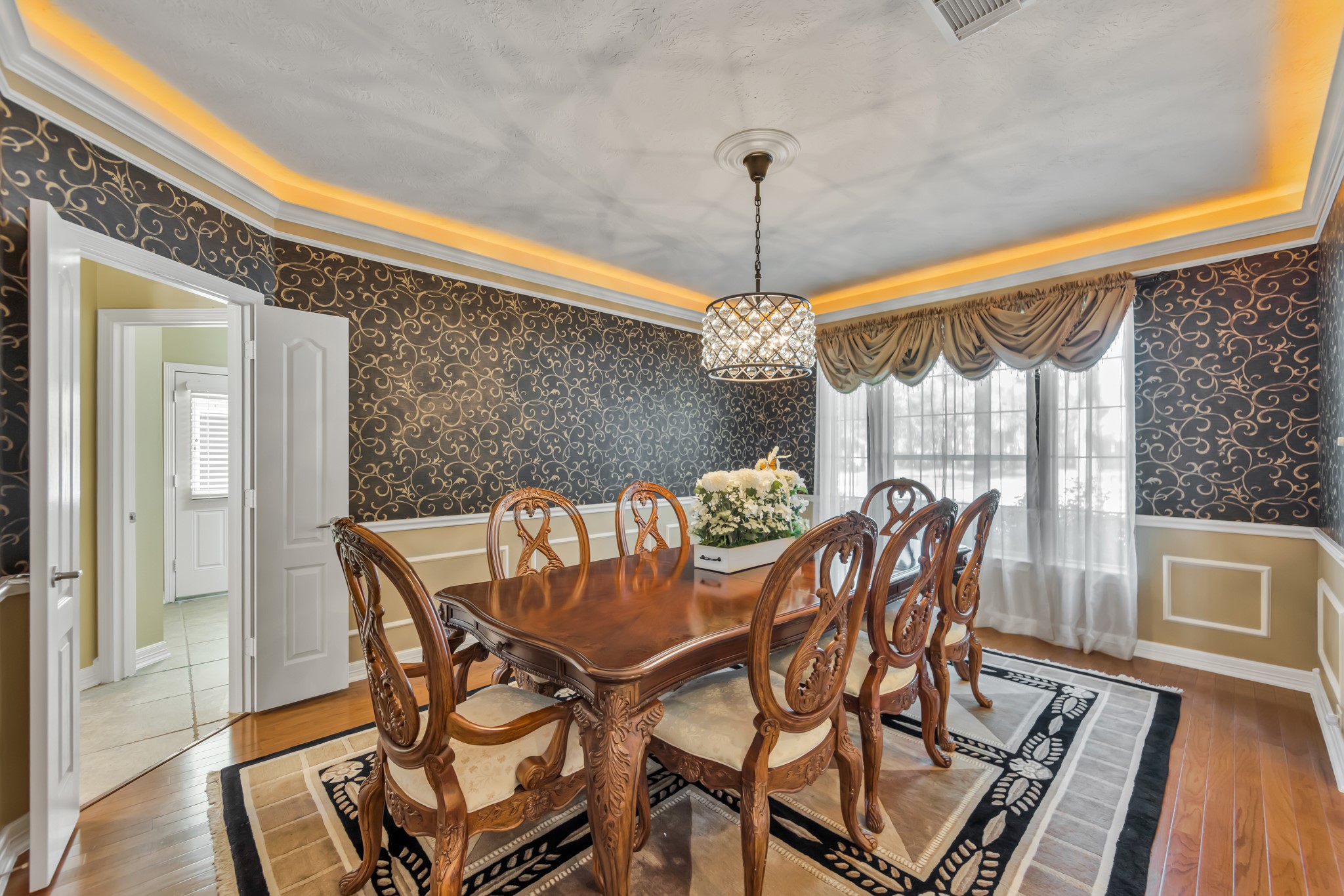 10410 Kilbride Way Court Spring, TX 77379 - Photo 6 of 49 Formal dining room with accent lighting, closet to display your glassware and a view of the lush front yard.