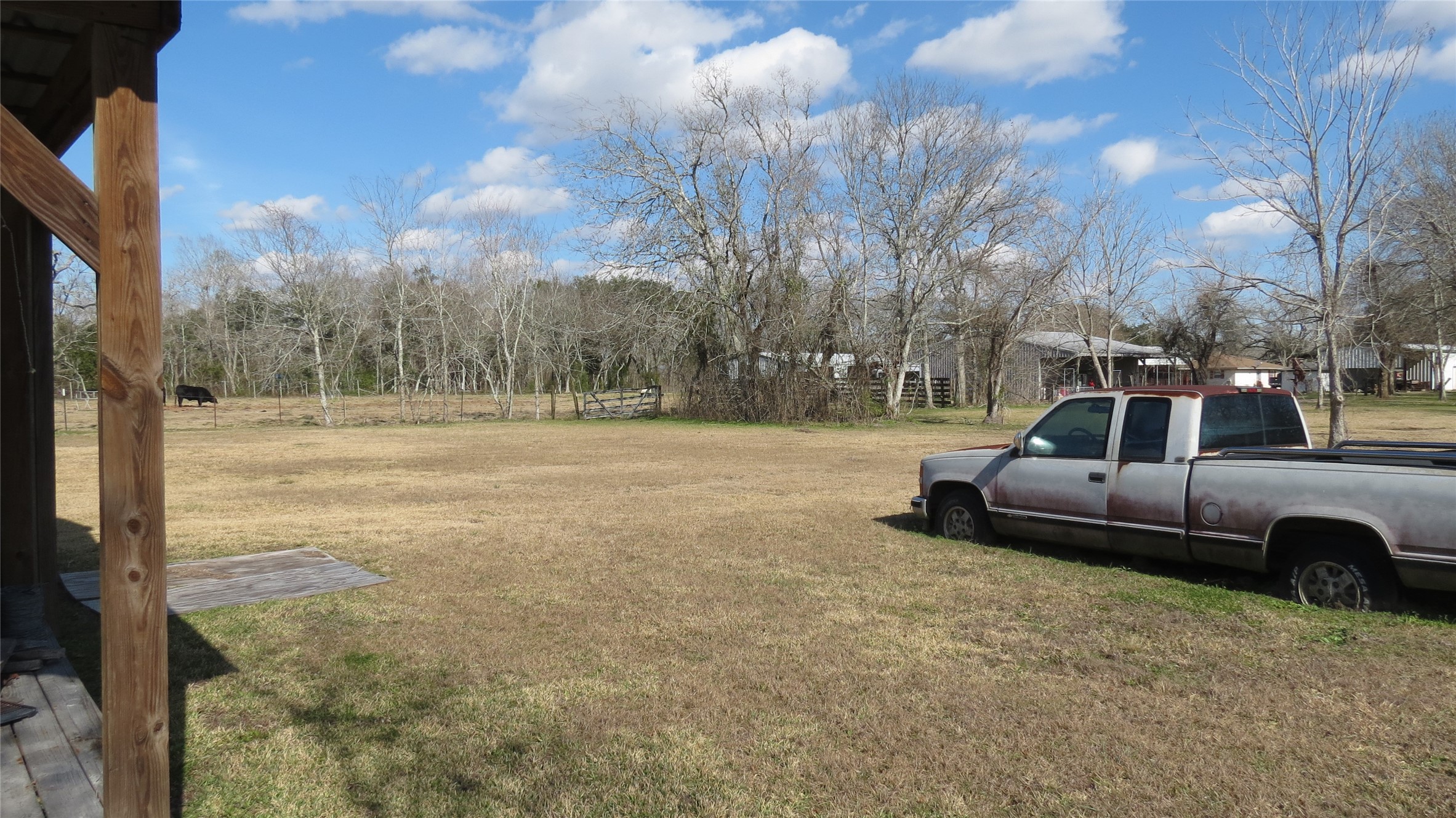 4936 Birch Road Santa Fe, TX 77517 - Photo 7 of 9 a front view of a house with a yard