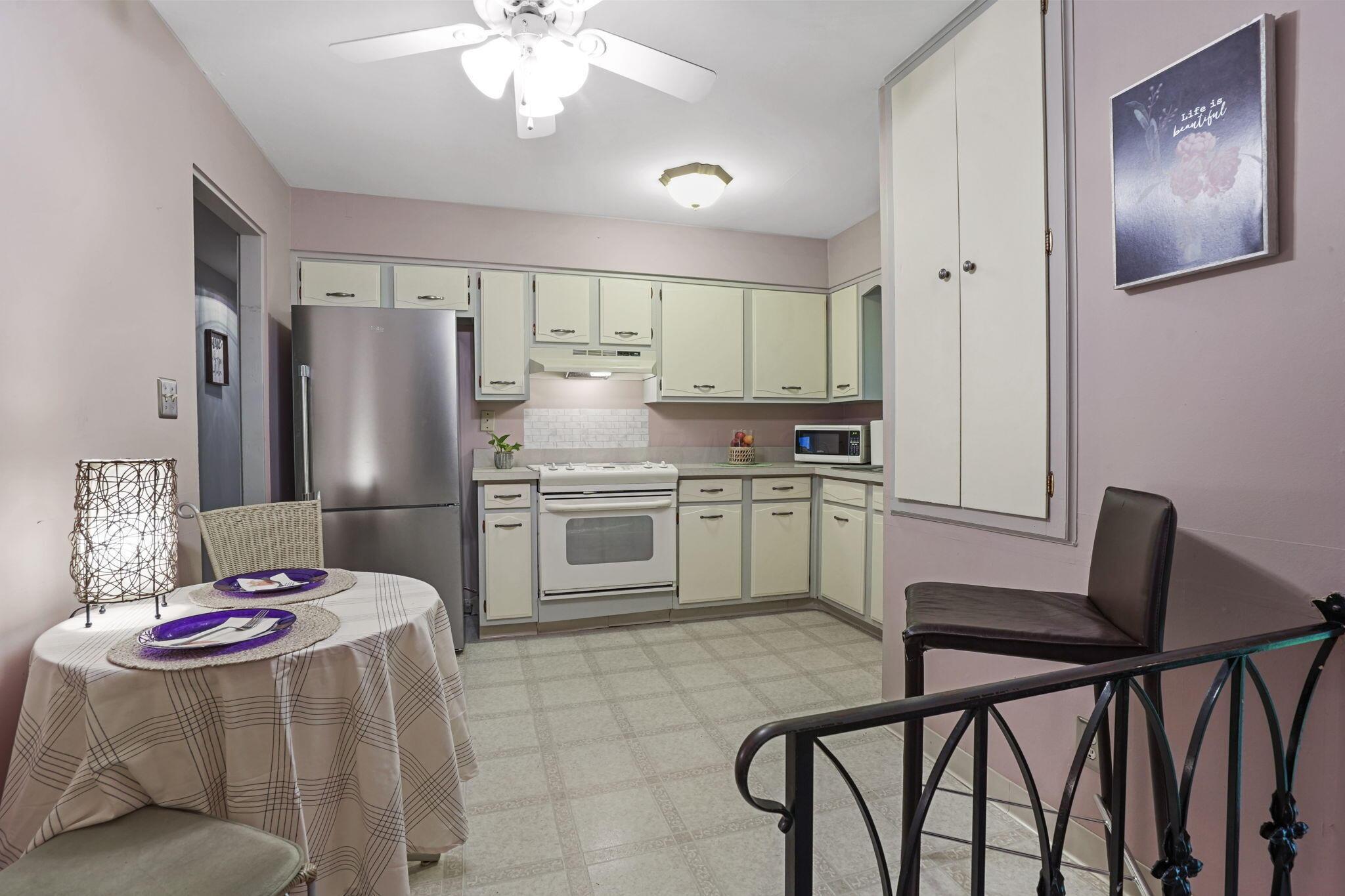 1325 Sunbury Road Columbus, OH 43219 - Photo 11 of 35 Kitchen - view from stairs to lower level