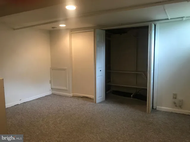 an empty room with closet