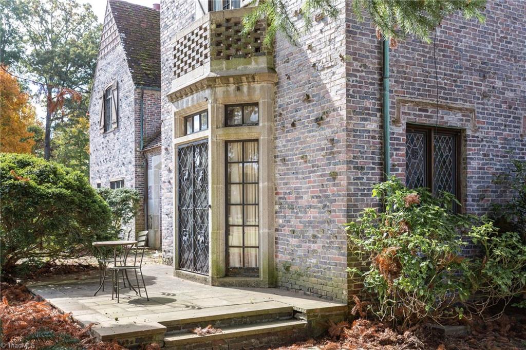 3215 North Rockingham Road Greensboro, NC 27407 - Photo 10 of 50 Ornate metal work and leaded glass windows