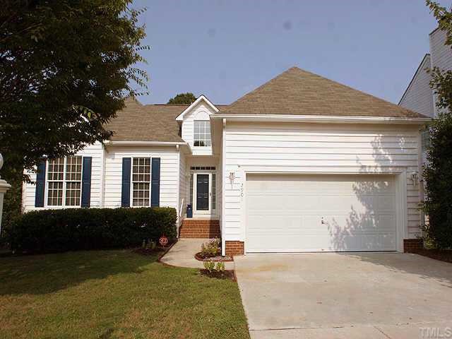 2901 Sedgefield Pines Lane Raleigh, NC 27604 - Photo 1 of 1 a front view of a house with a yard and garage