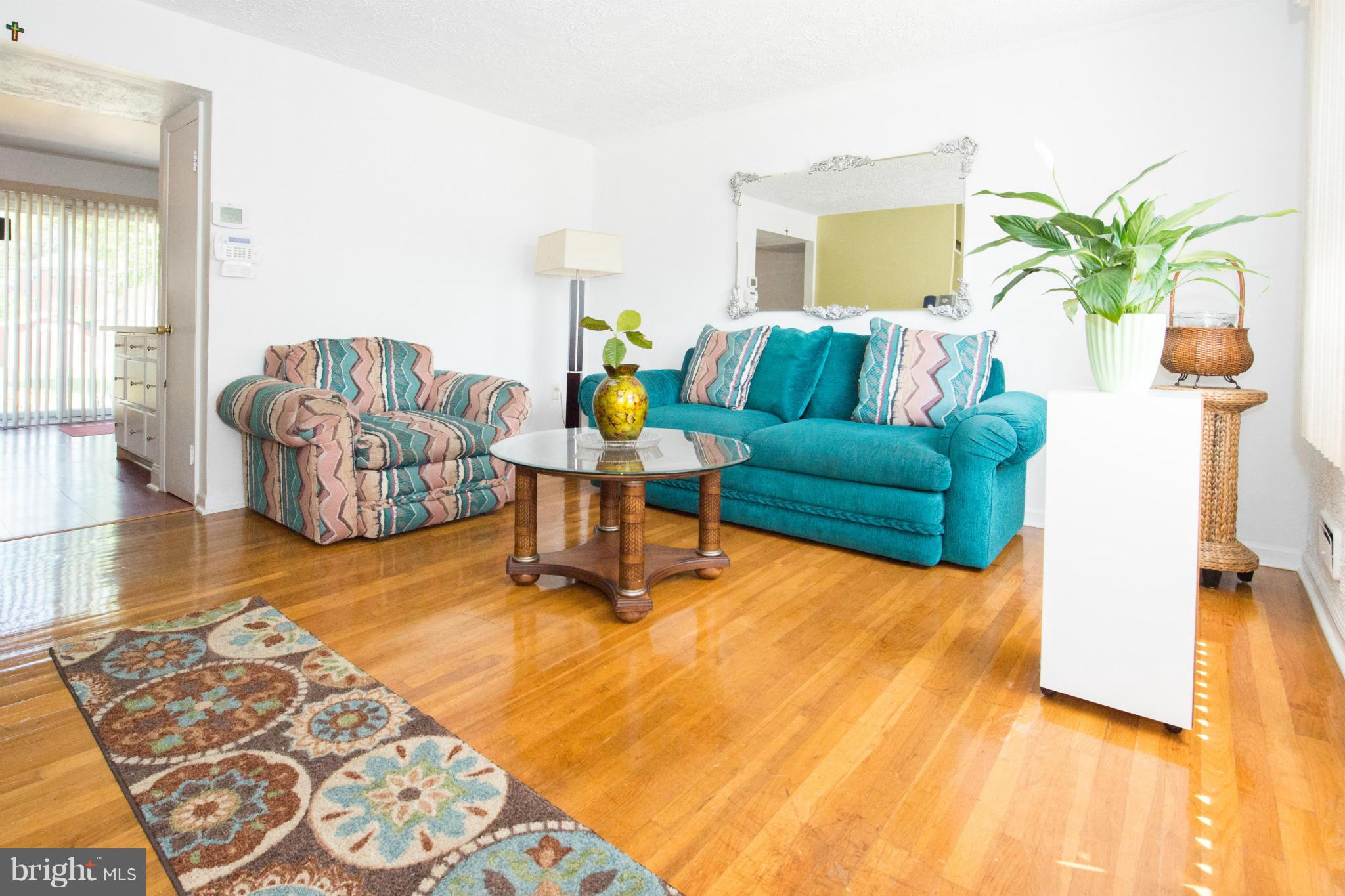 4738 Vancouver Road Baltimore, MD 21229 - Photo 21 of 30 a living room with furniture and a couch