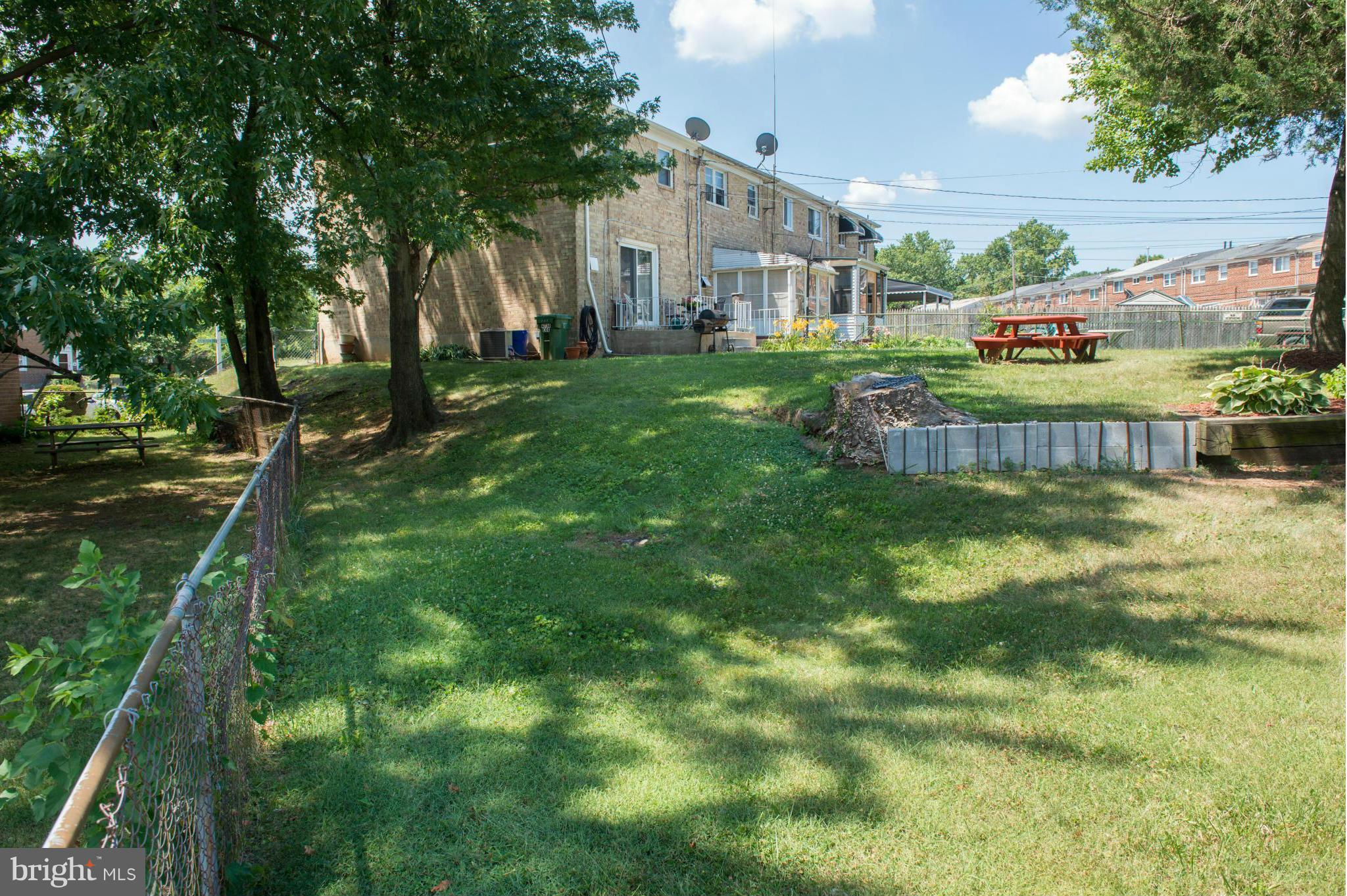 4738 Vancouver Road Baltimore, MD 21229 - Photo 4 of 30 a view of a house with a yard