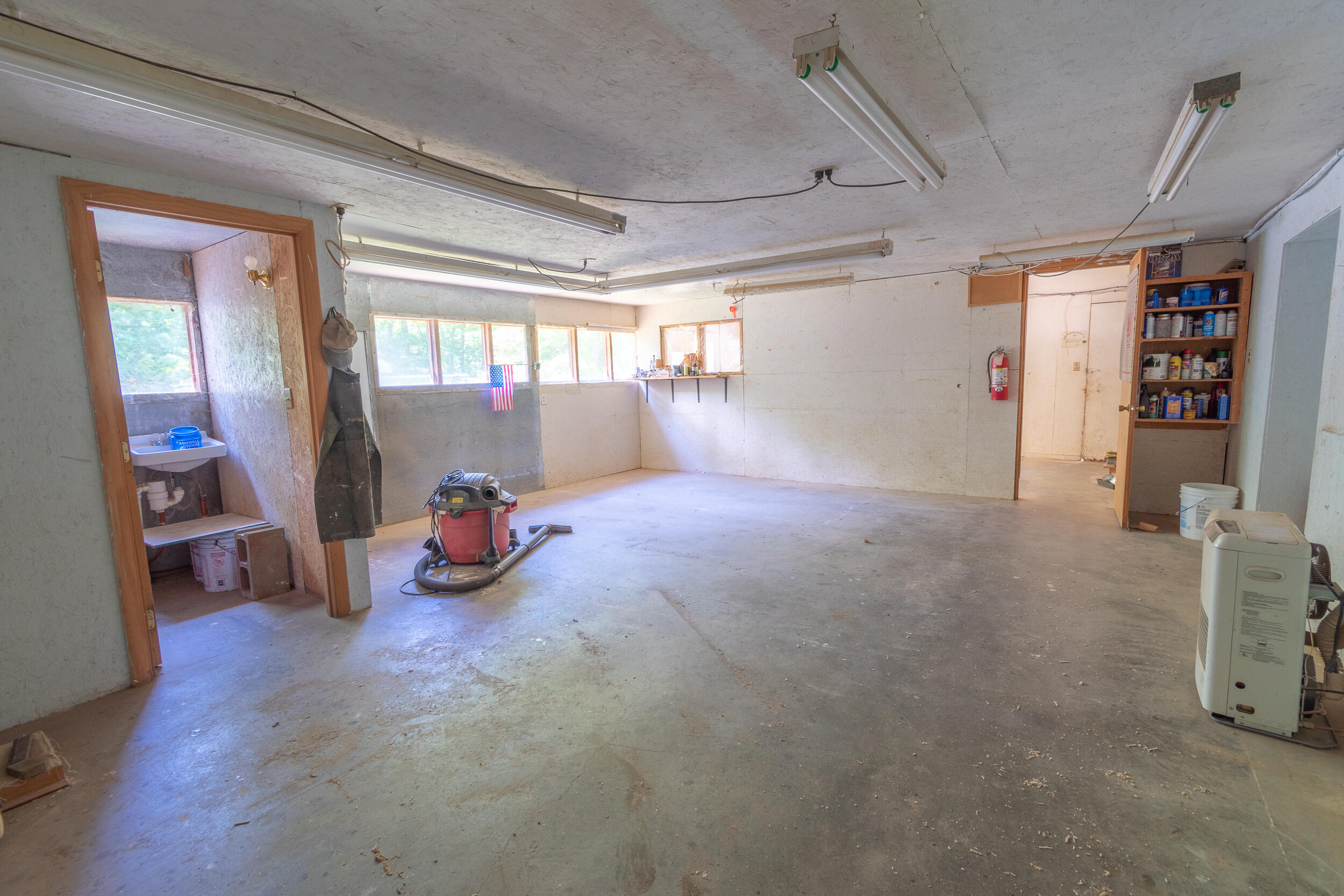 81 Mitchell Brook Road Temple, ME 04984 - Photo 22 of 33 Another Room in Workshop With 1/2 Bath